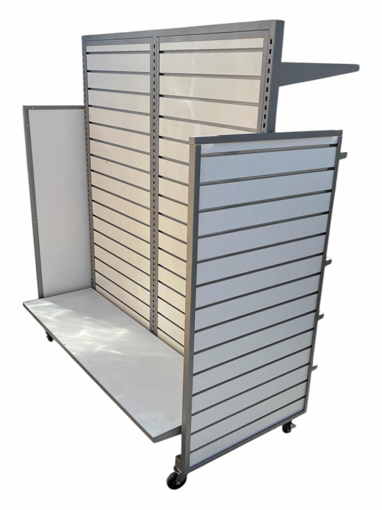 Photo 1 of MULTI SHELF DUAL SIDED ROLLING DISPLAY RACK 51” X 32” H60”