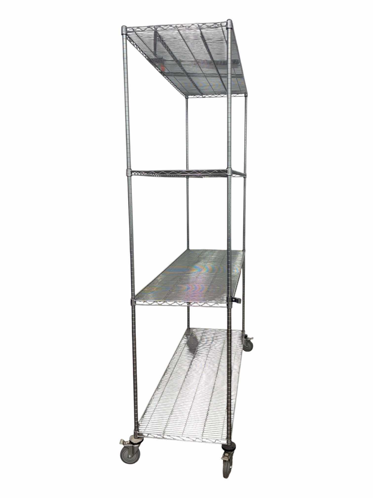 Photo 1 of NEXEL STAINLESS STEEL ROLLING METRO RACK 48” X 24” H102”