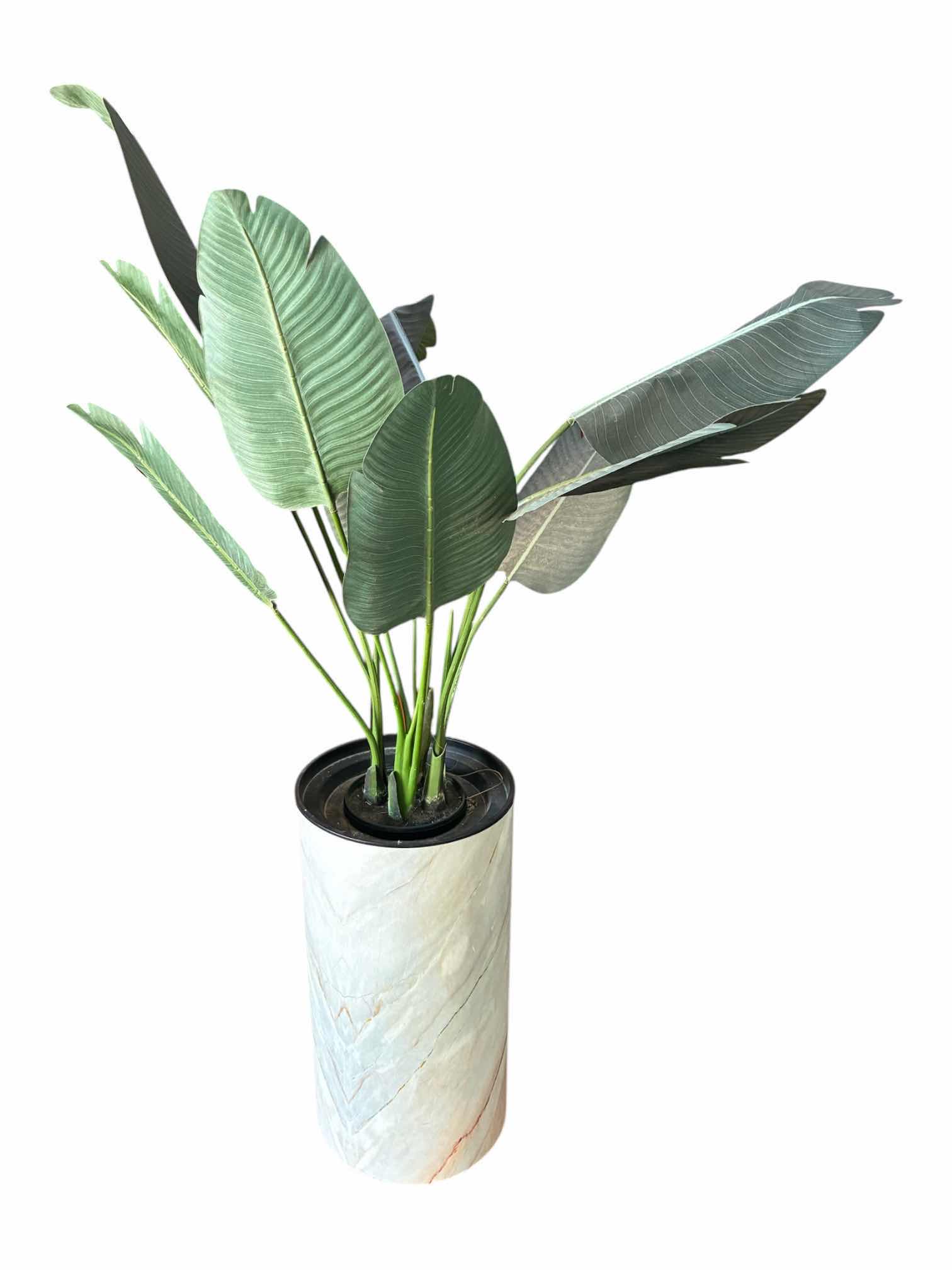 Photo 1 of ARTIFICIAL PALM PLANT W STONE PLASTIC PLANTER 30” X 60”