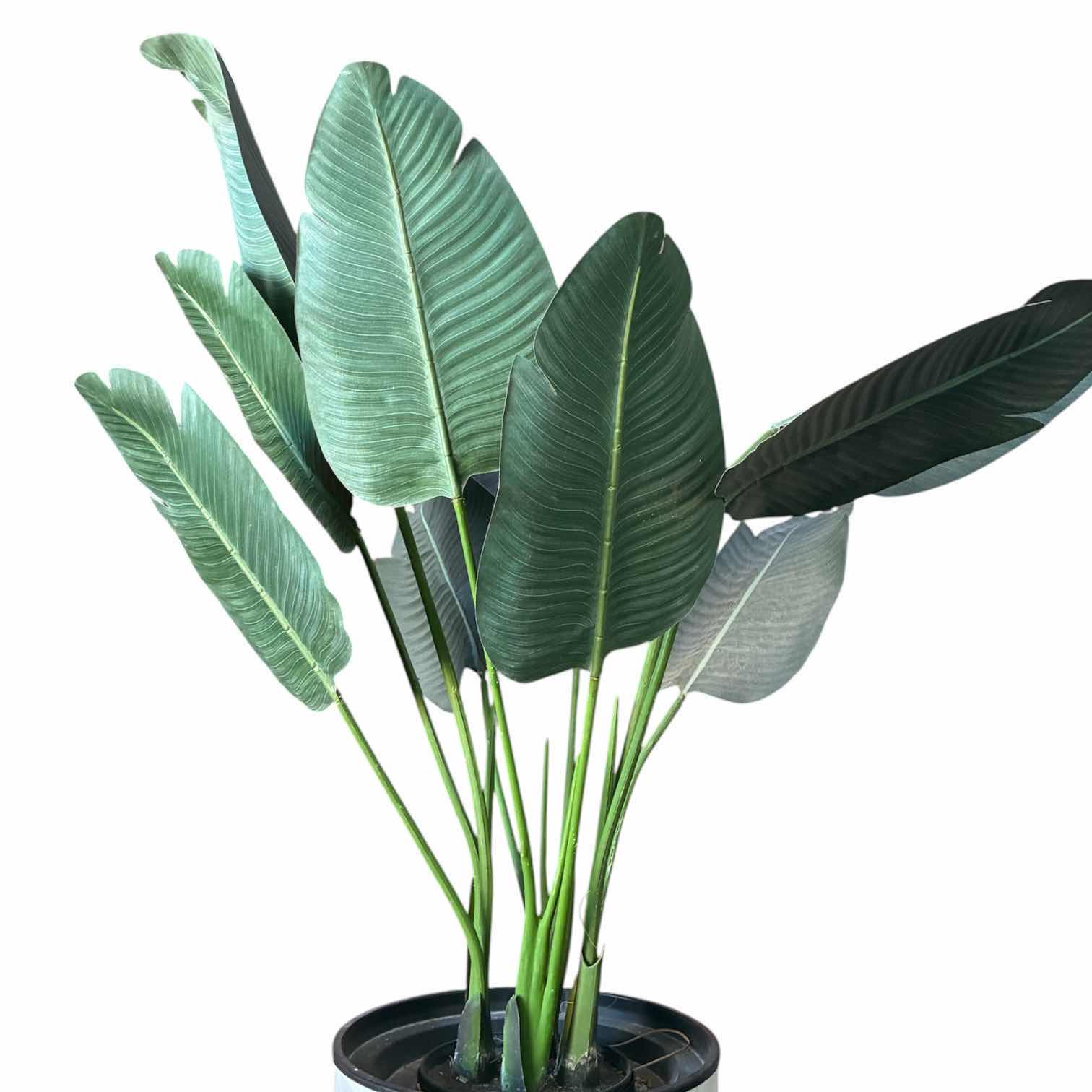 Photo 1 of ARTIFICIAL PALM PLANT W STONE FINISH PLASTIC PLANTER 30” X 60”