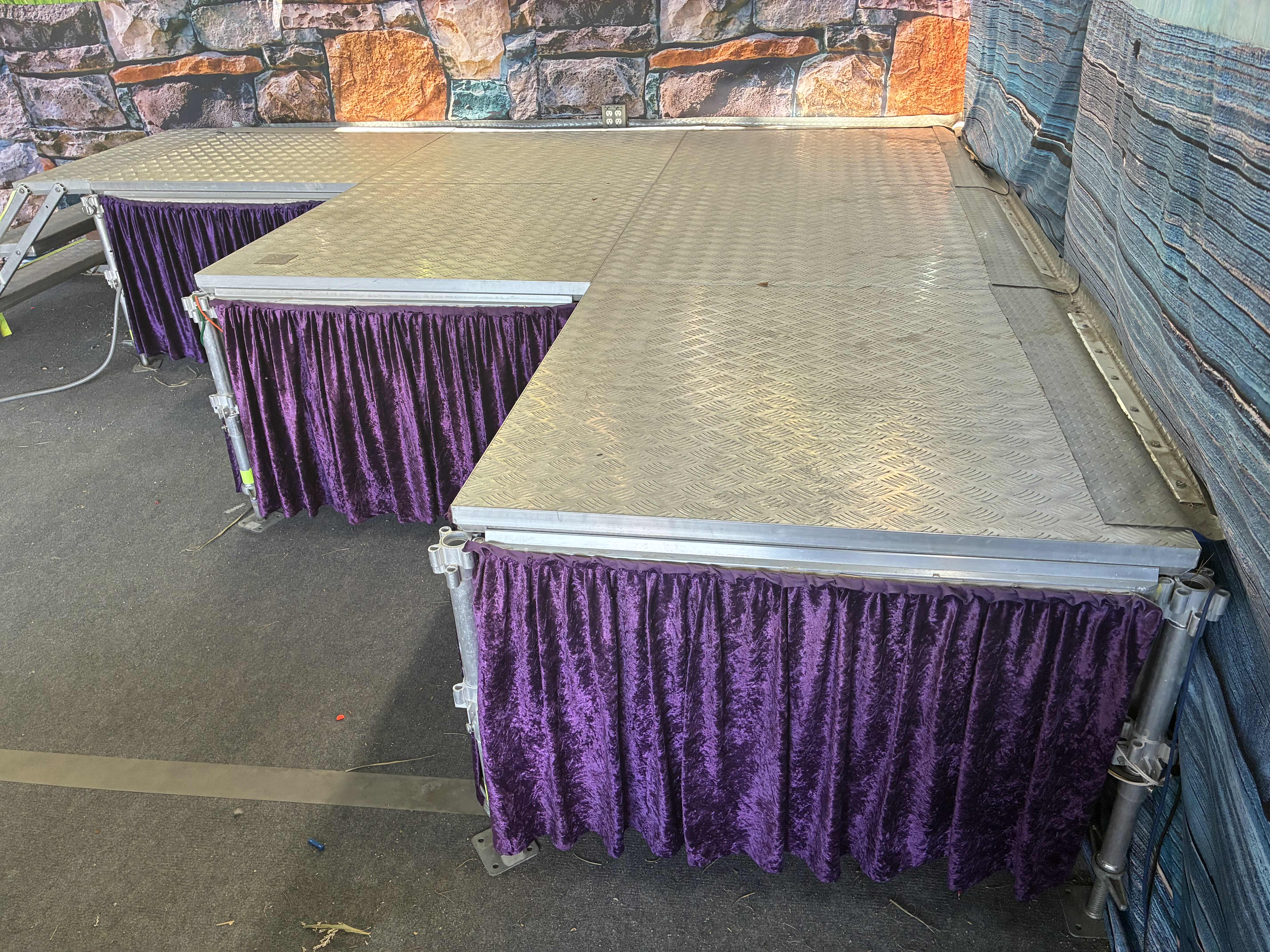 Photo 1 of STAINLESS STEEL MODULE L-SHAPED PERFORMANCE STAGE 195” X 146” H35” (READ NOTES)