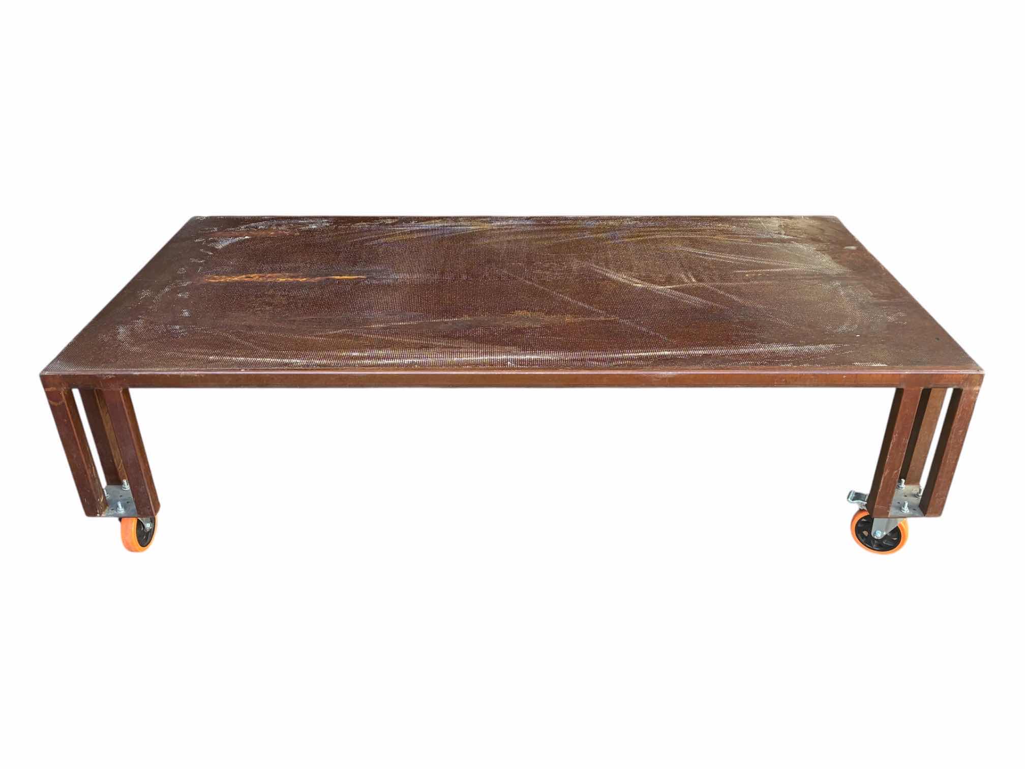 Photo 1 of STEEL ROLLING PATIO COFFEE TABLE 37” X 73.5” H21”