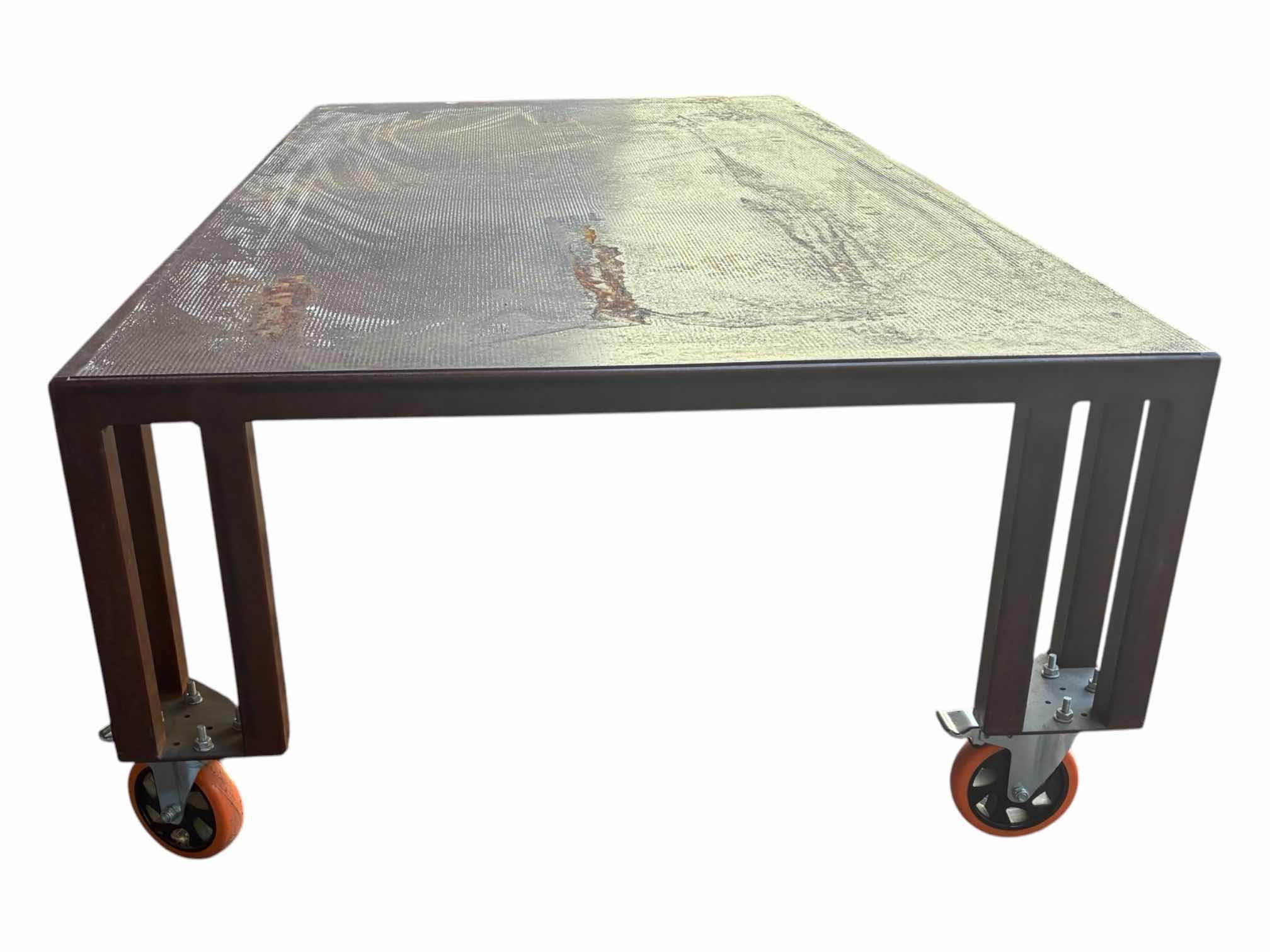 Photo 1 of WELDED STEEL ROLLING PATIO COFFEE TABLE 37” X 73.5” H21”