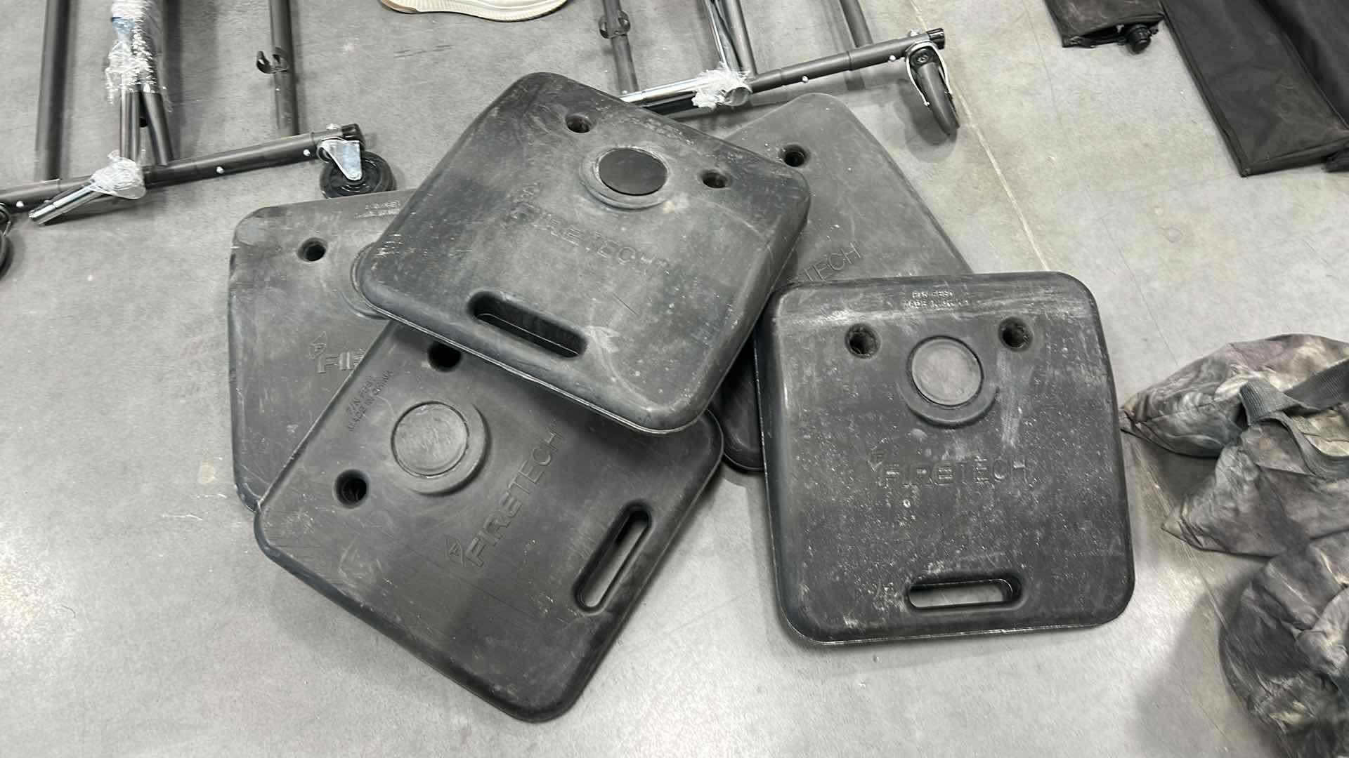 Photo 1 of FIRETECH BALLAST WEIGHT,S SPECIFICALLY THE P/N FES1 MODEL, USED FOR SECURING TEMPORARY FENCING AND BARRIERS.