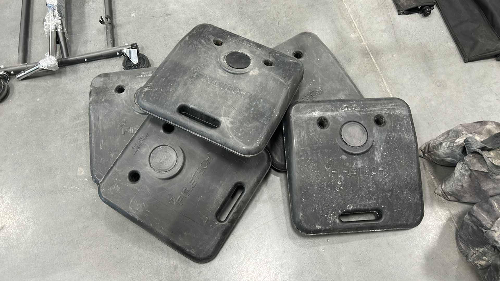 Photo 1 of FIRETECH BALLAST WEIGHT,S SPECIFICALLY THE P/N FES1 MODEL, USED FOR SECURING TEMPORARY FENCING AND BARRIERS.