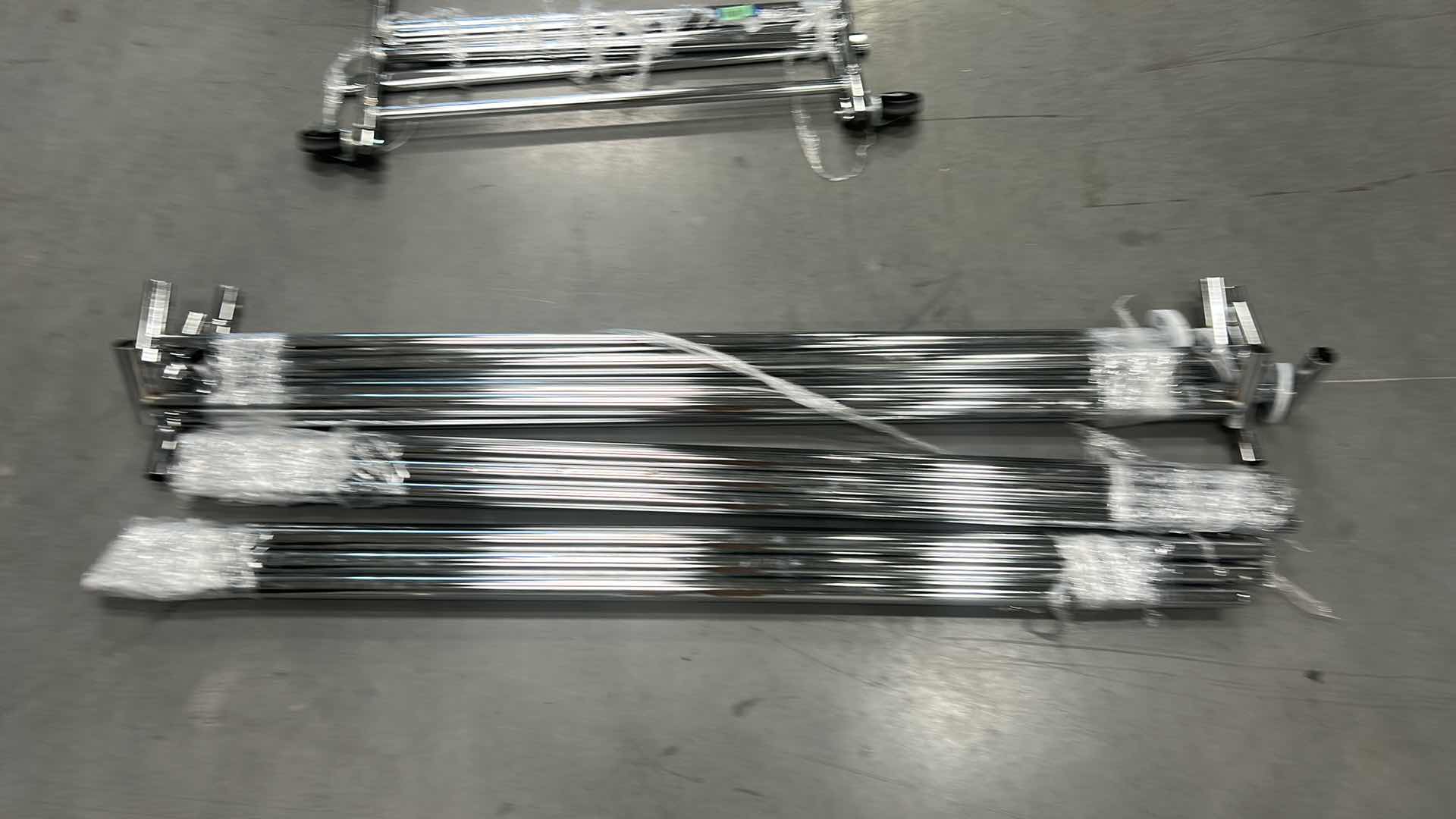 Photo 1 of METAL BARS FOR CLOTHING RACKS