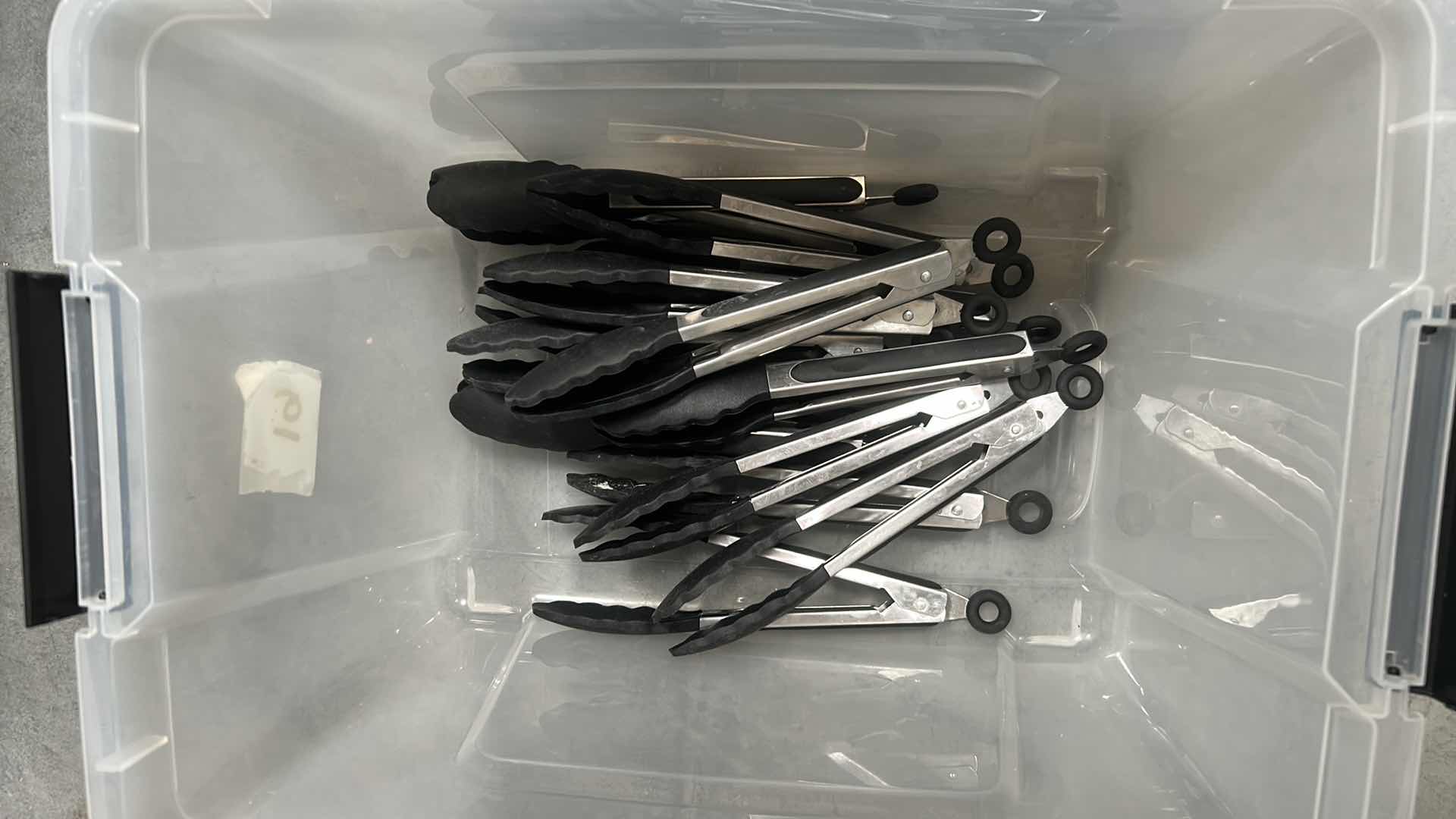 Photo 1 of CONTENTS OF 2 CONTAINERS BLACK PLASTIC SERVING UTENSILS