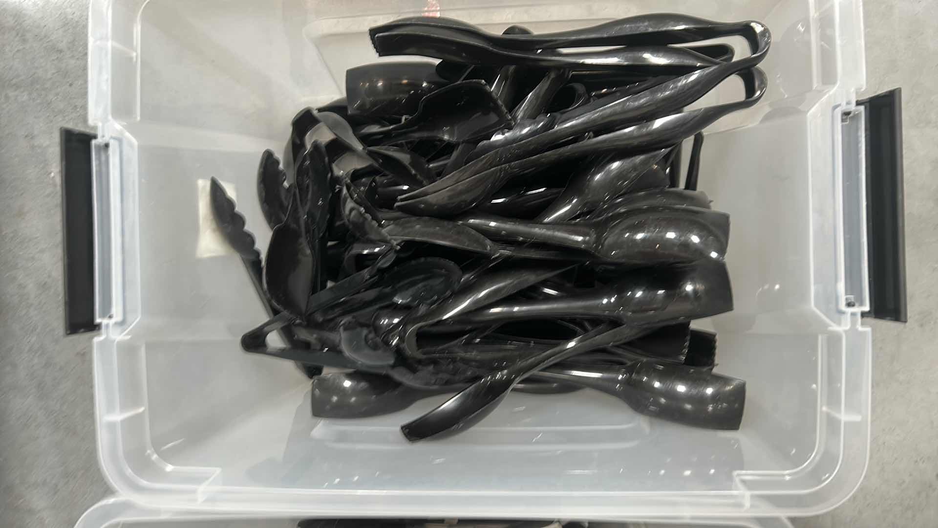 Photo 1 of CONTENTS OF 2 CONTAINERS BLACK PLASTIC SERVING UTENSILS