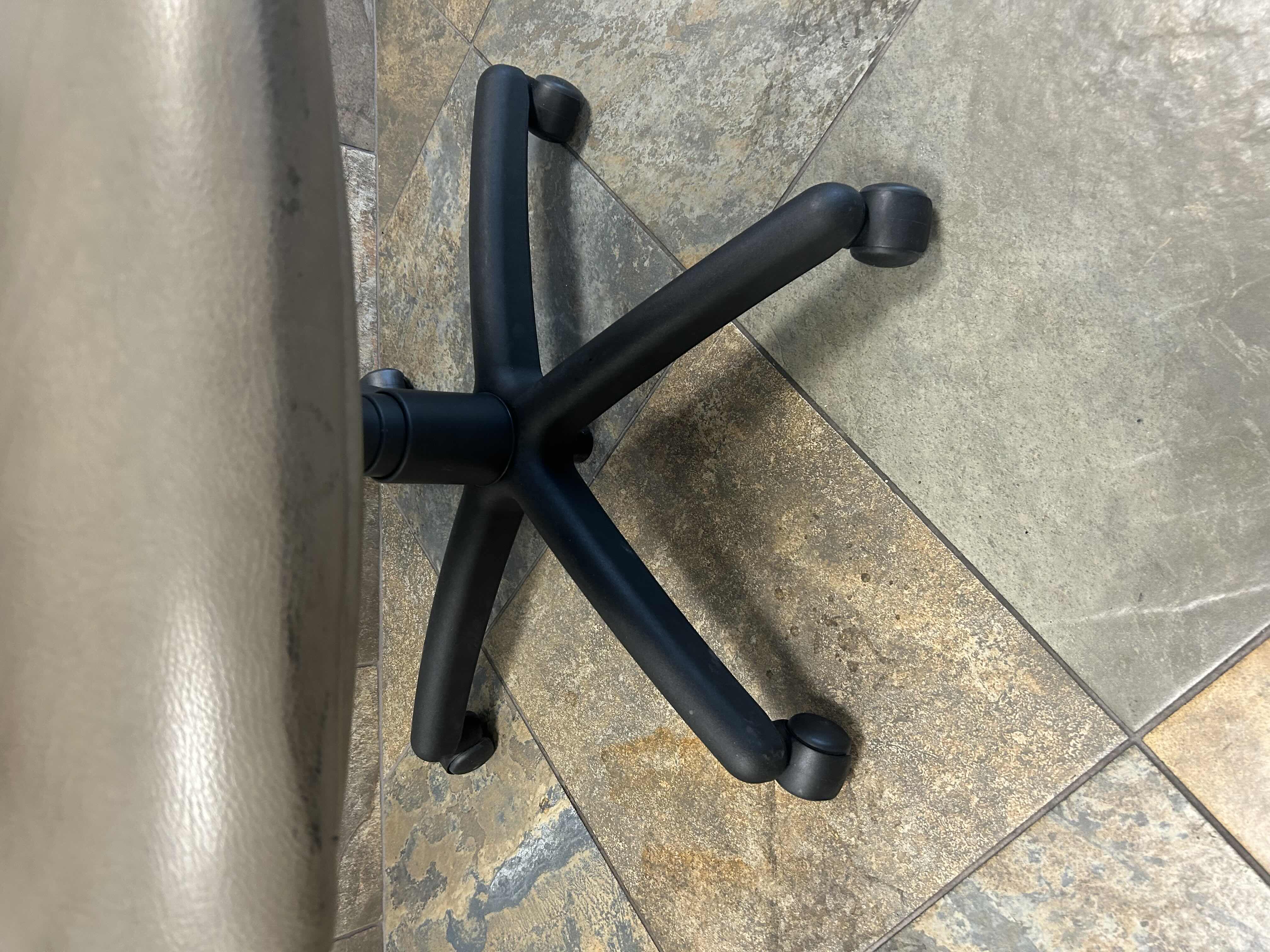 Photo 1 of BEIGE SWIVEL LEATHER OFFICE CHAIR ON CASTERS 