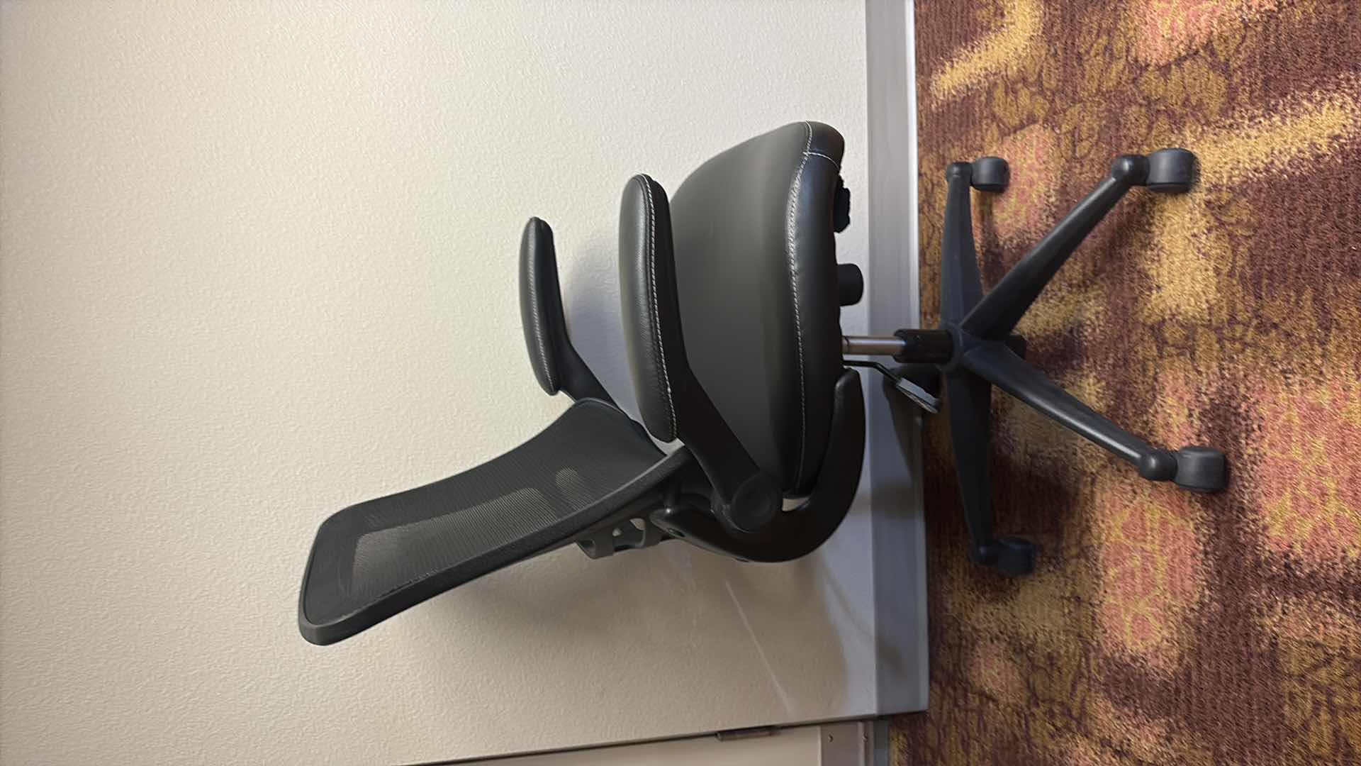 Photo 1 of BLACK TECHNI MOBILI MID BACK MESH ADJUSTABLE ARM CHAIR 