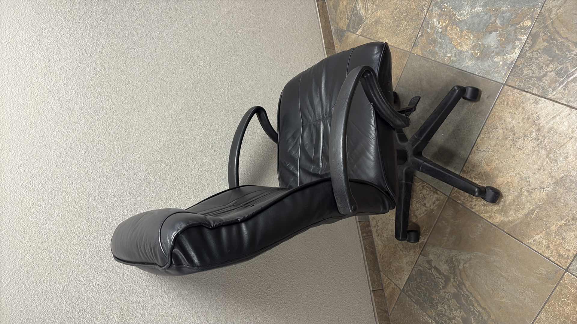Photo 1 of BLACK LEATHER EXECUTIVE ROLLING OFFICE CHAIR 