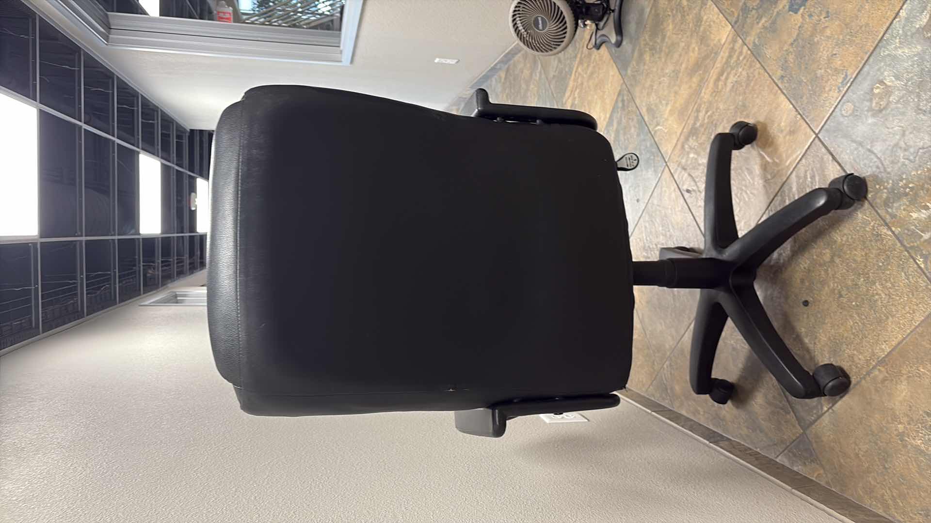 Photo 1 of BLACK FAUX LEATHER EXECUTIVE ROLLING OFFICE CHAIR