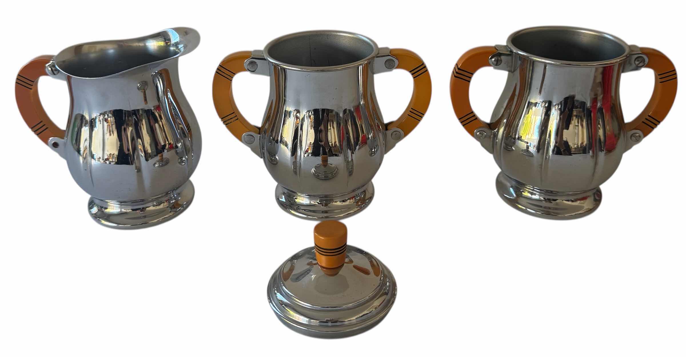 Photo 1 of VINTAGE KROME KRAFT SUGAR BOWL AND CREAMER SET SILVER TONE TRAY SIZE D12” X H6”