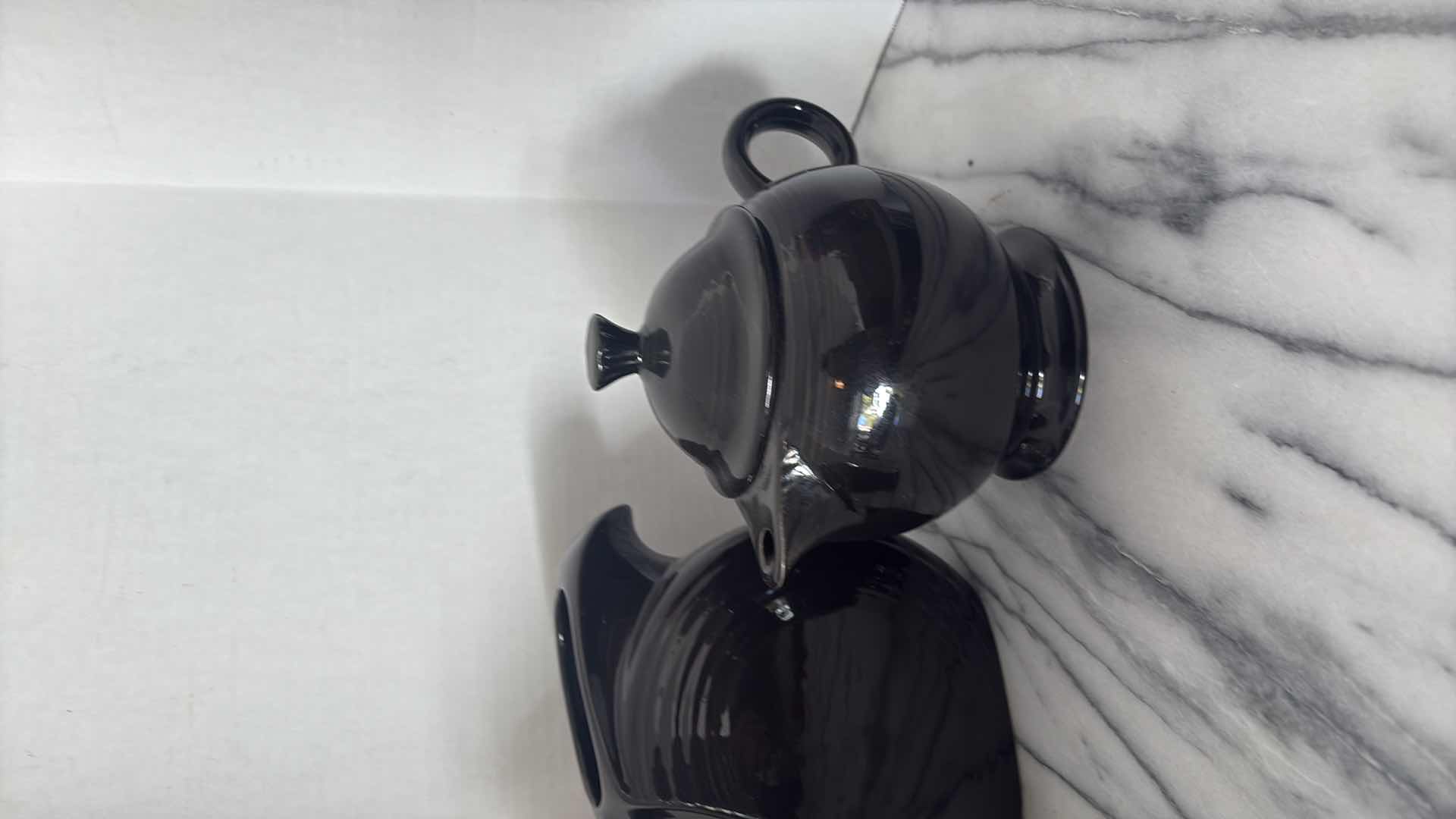 Photo 1 of BLACK CERAMIC TEAPOTS 12”