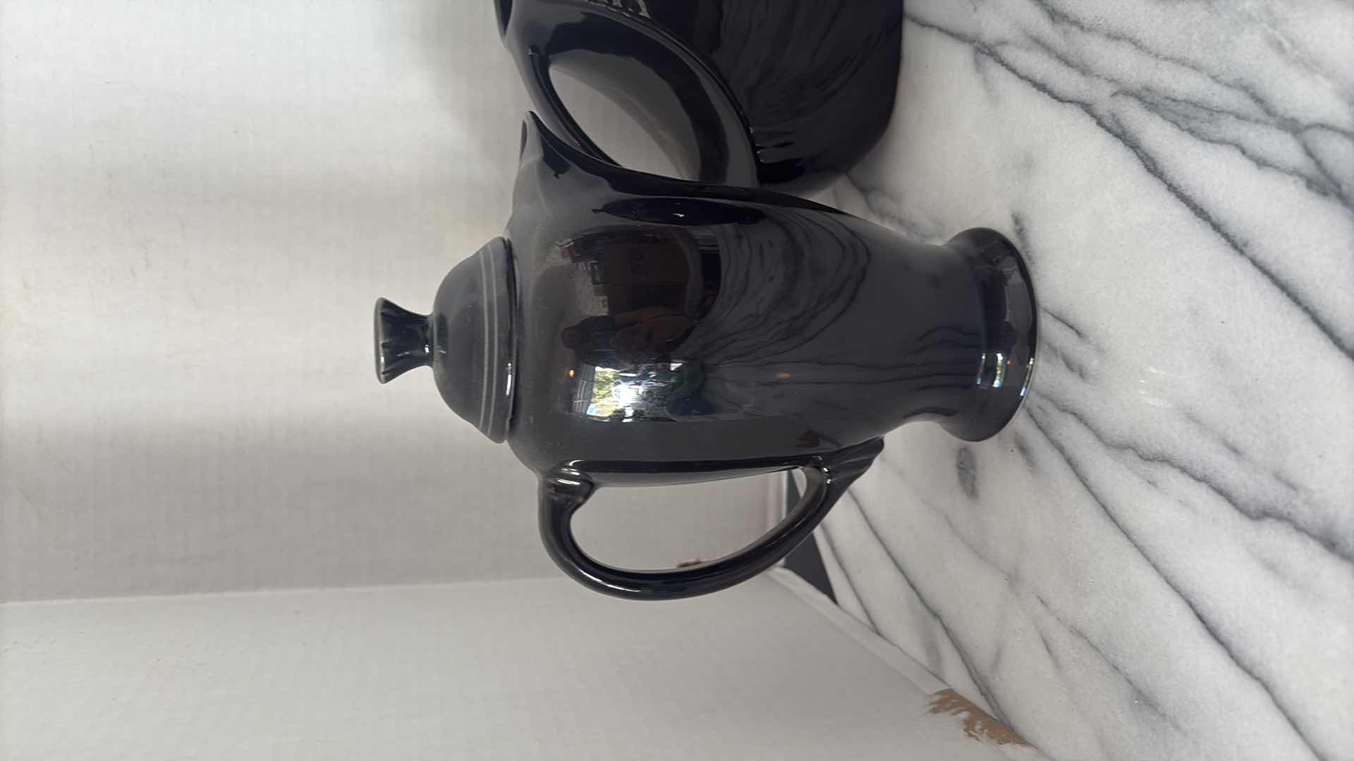Photo 1 of BLACK CERAMIC TEAPOTS 12”