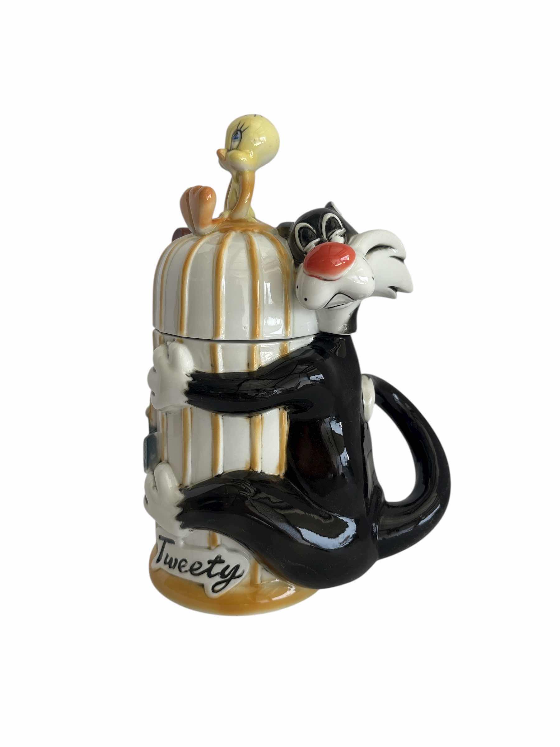 Photo 1 of LOONEY TUNES “TWEETY AND SYLVESTER COLLECTIBLE” STEIN