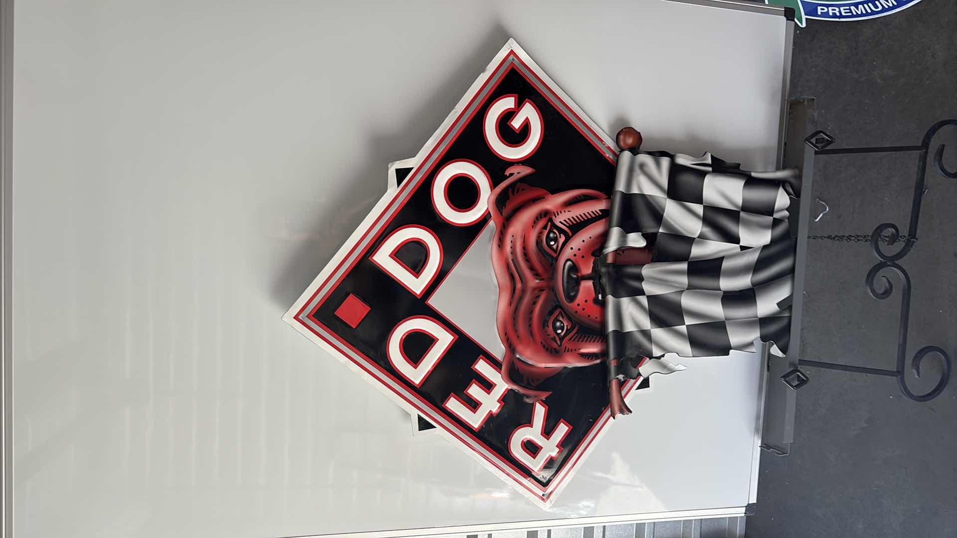 Photo 1 of METAL RED DOG BEER SIGN RETAIL$150