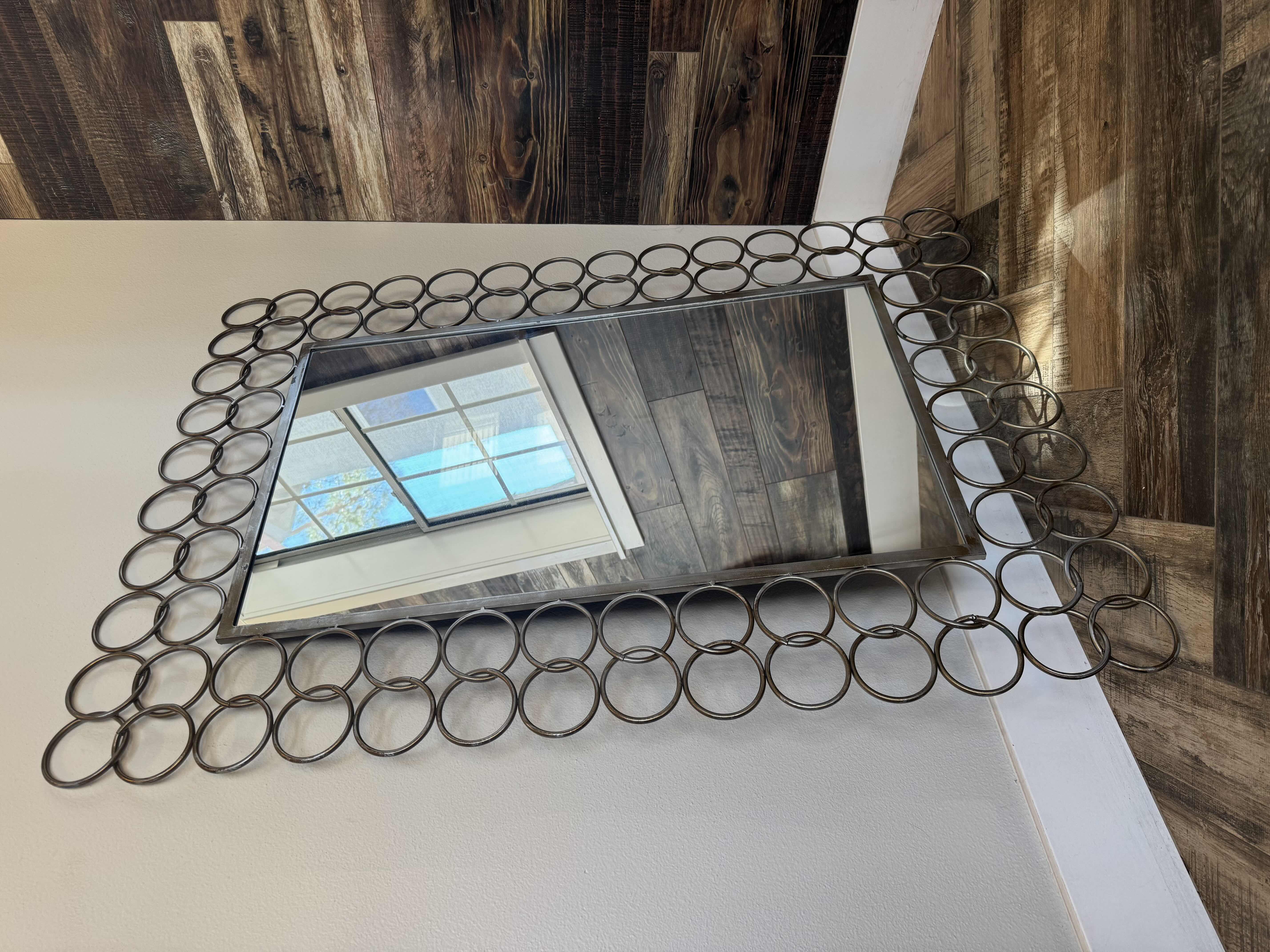 Photo 1 of DECORATIVE METAL RING WALL MIRROR 35”x49”