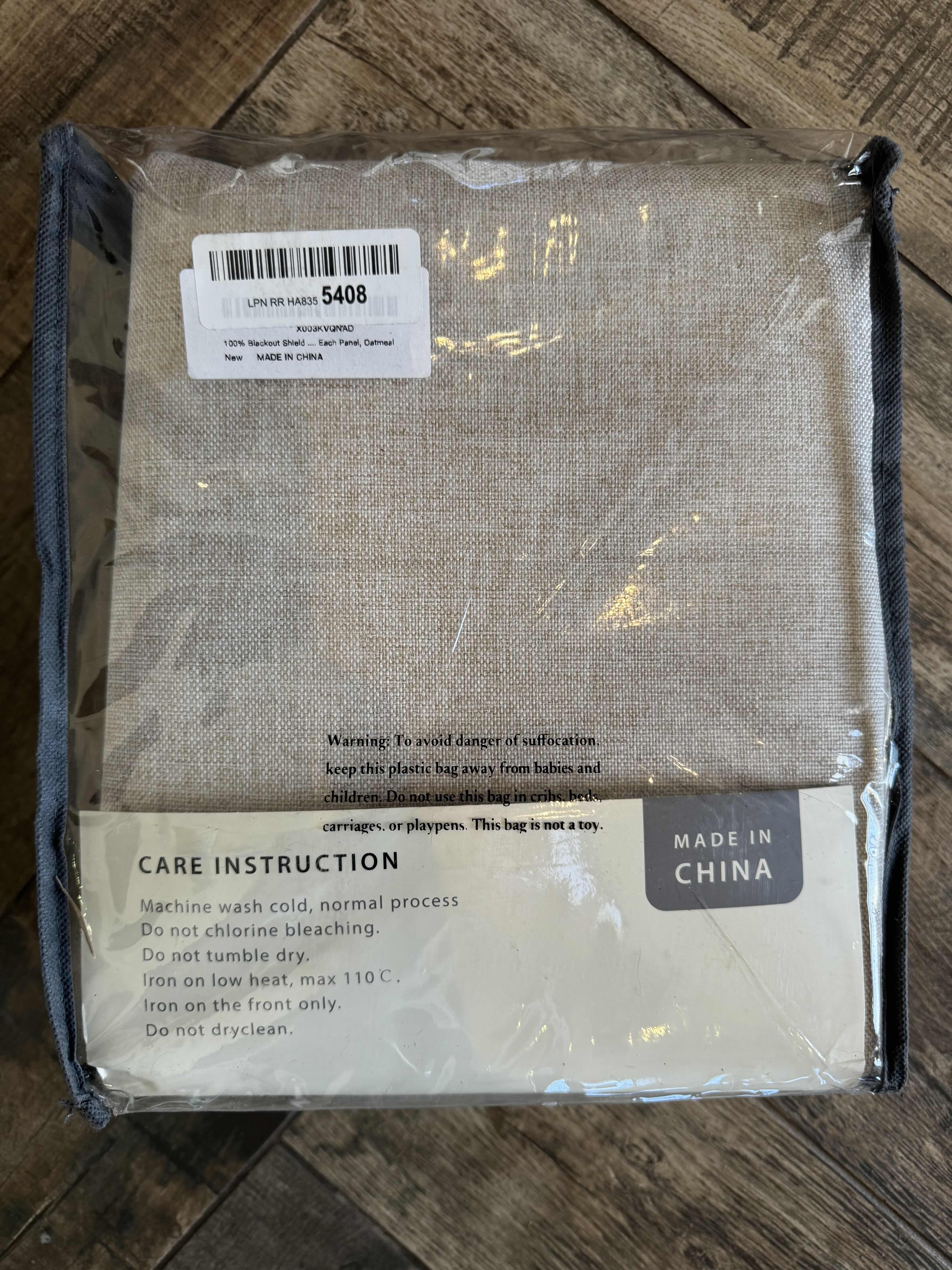 Photo 1 of NIP OATMEAL BLACKOUT CURTAIN, DECORATIVE BLACK & GOLD PILLOW 
