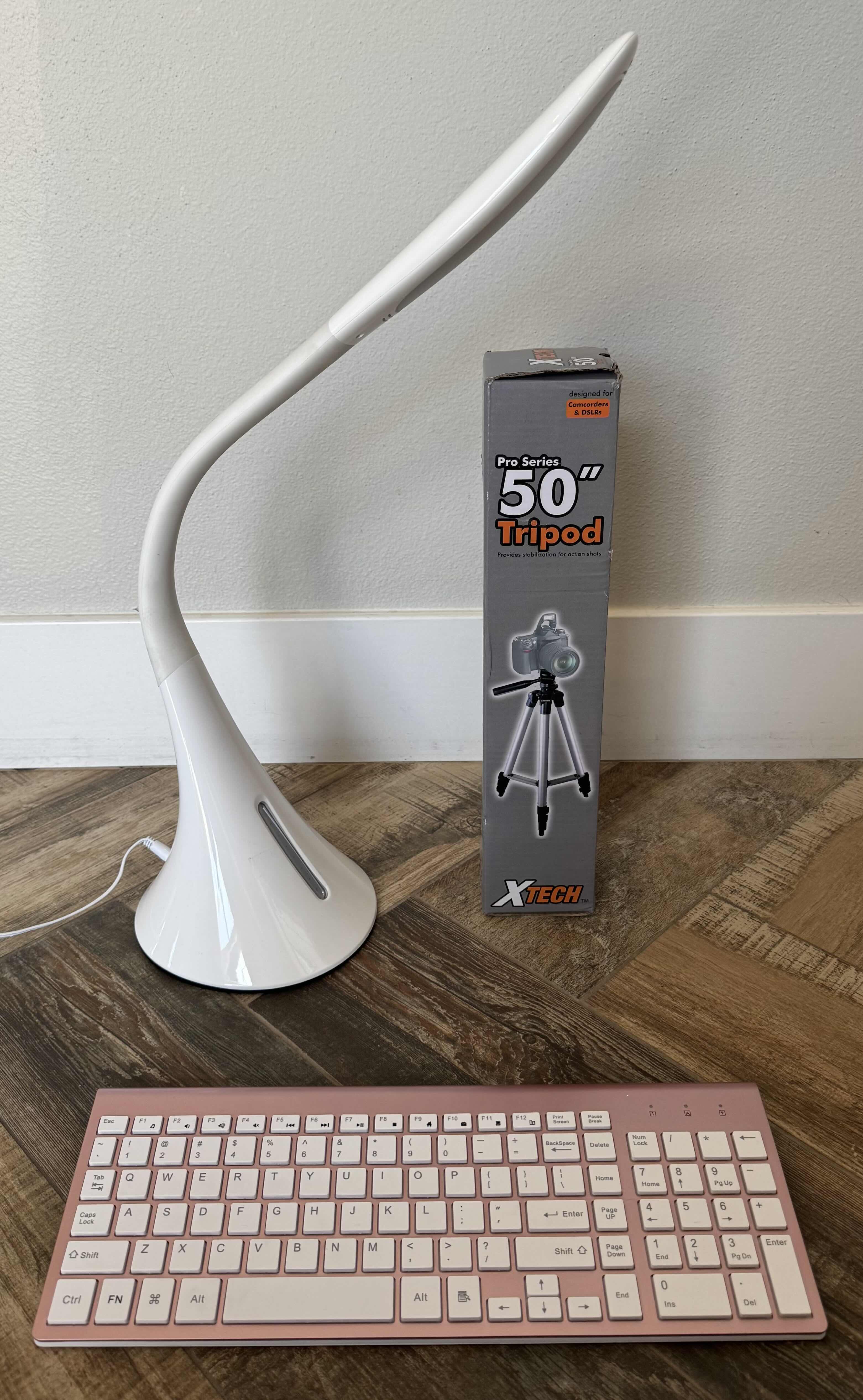 Photo 1 of WHITE ADJUSTABLE DESK LAMP, 50” TRIPOD,PINK WIRELESS KEYBOARD 
