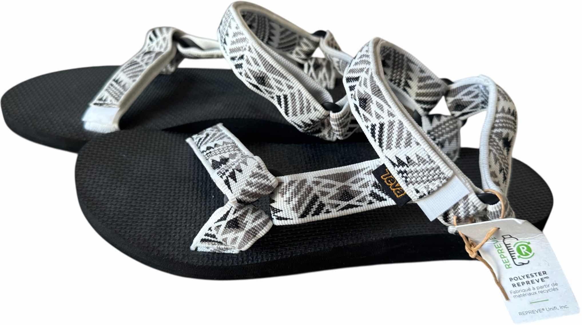Photo 1 of NEW TEVA  BLACK & WHITE UNIVERSAL WOMENS SANDALS (SIZE 8 )

