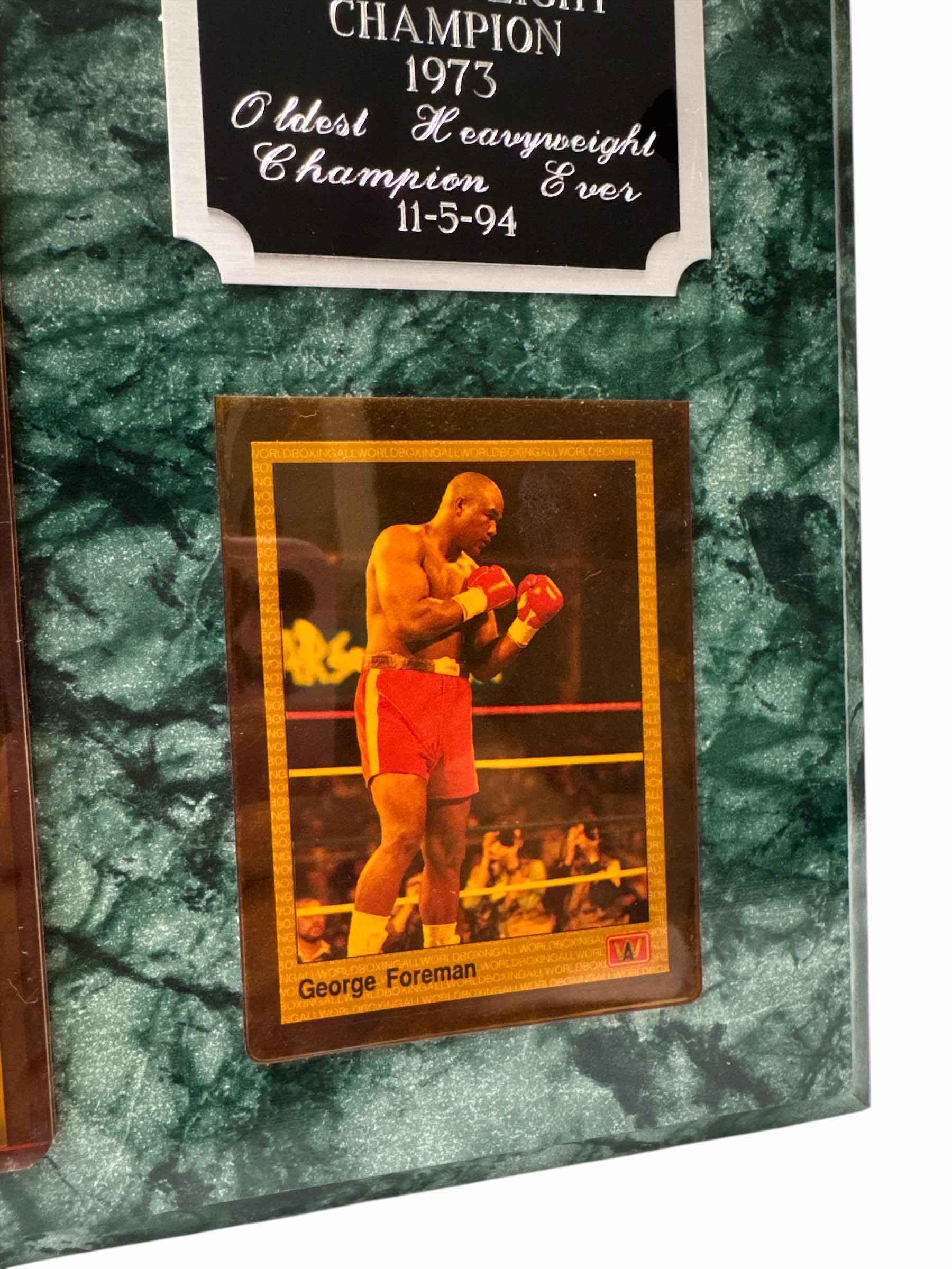 Photo 1 of VINTAGE GEORGE FOREMAN WOODEN WALL PLAQUE PICTURE AND CARD 
W15” X L12”
