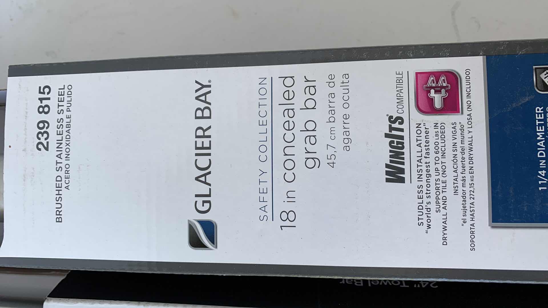 Photo 1 of 2 TOWEL HOLDERS AND A SHOWER GRAB BAR