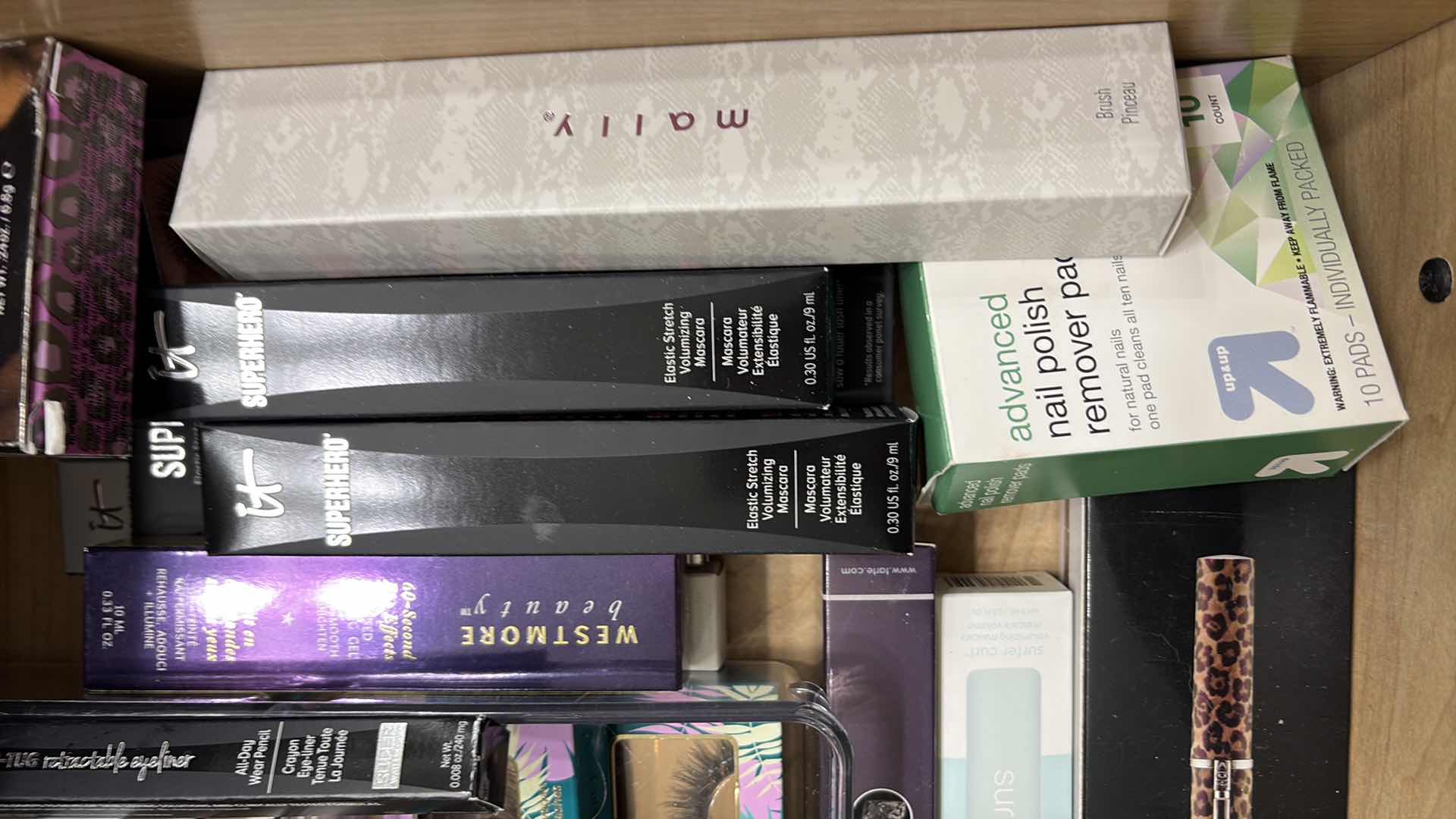 Photo 1 of CONTENTS OF PRIMARY BATHROOM DRAWERS-MAKEUP,EYELASHES & HAIR ITEMS