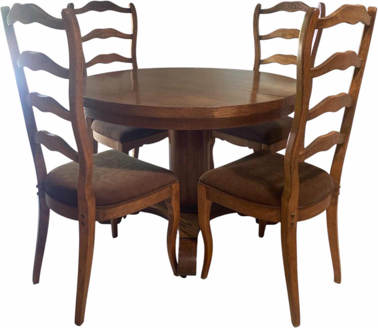 Photo 1 of 42” ROUND WOOD OAK TABLE WITH 3 LEAFS 9” AND FOUR CHAIRS H30”