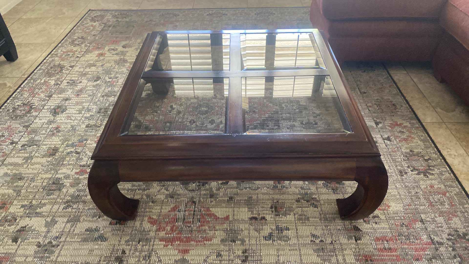 Photo 1 of DARK WOOD COFFEE TABLE WITH BEVELED GLASS TOP 40” X 40” H 16”