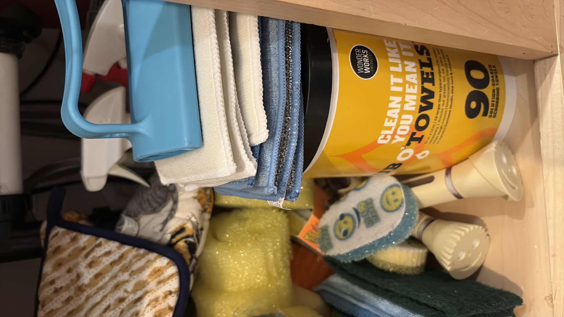 Photo 1 of CONTENTS OF CABINET UNDERNEATH SINK