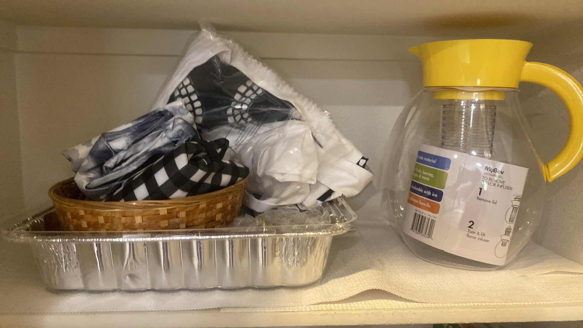 Photo 1 of TWO SHELVES IN PANTRY WRAPS CUPS & PITCHER