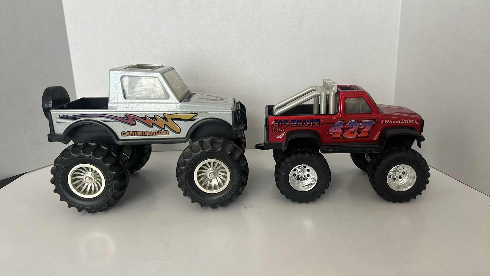 Photo 1 of 2-TOY MONSTER TRUCKS