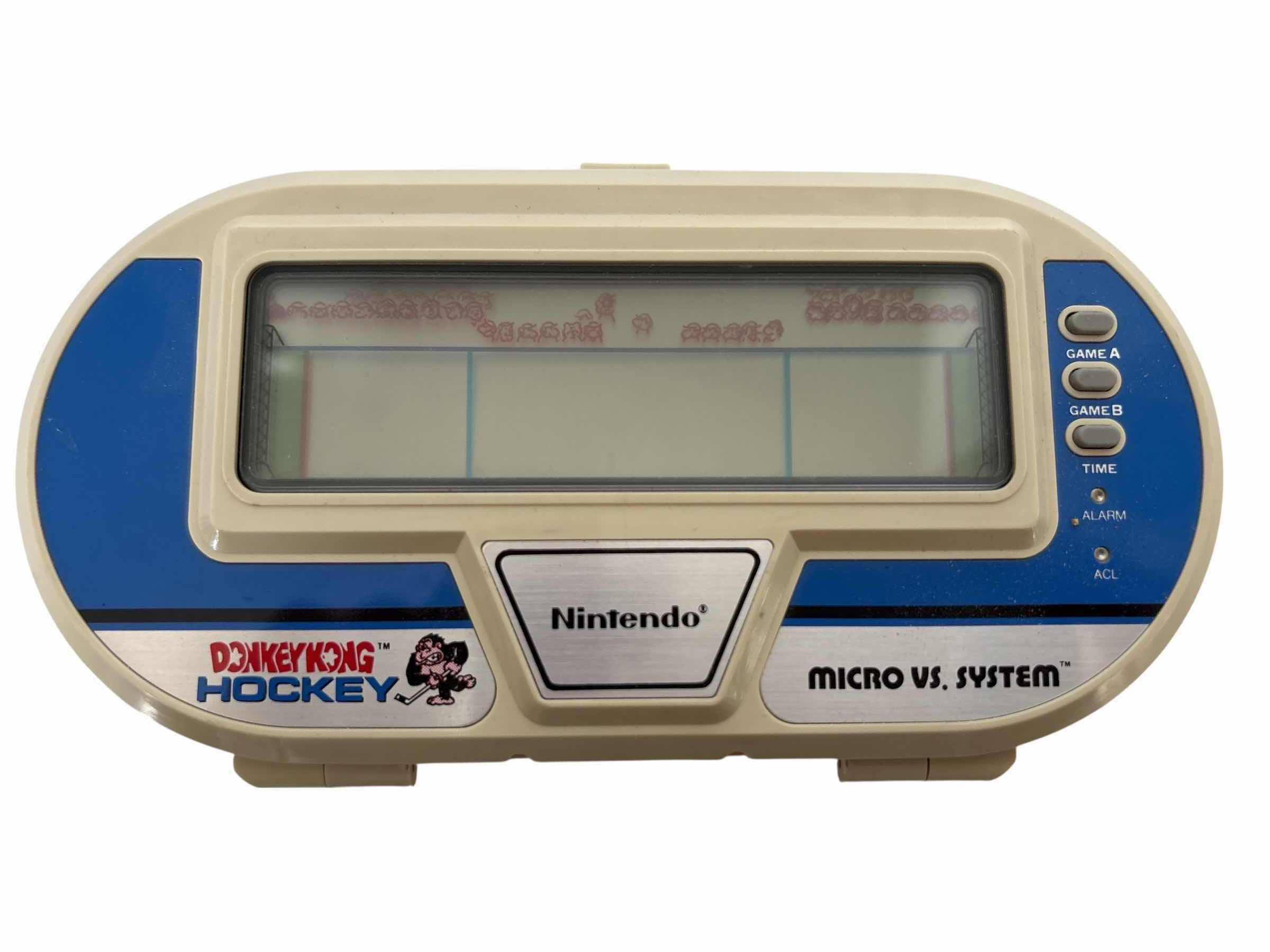 Photo 1 of VINTAGE NINTENDO 1984 DONKEY KONG HOCKEY MICRO VS. SYSTEM