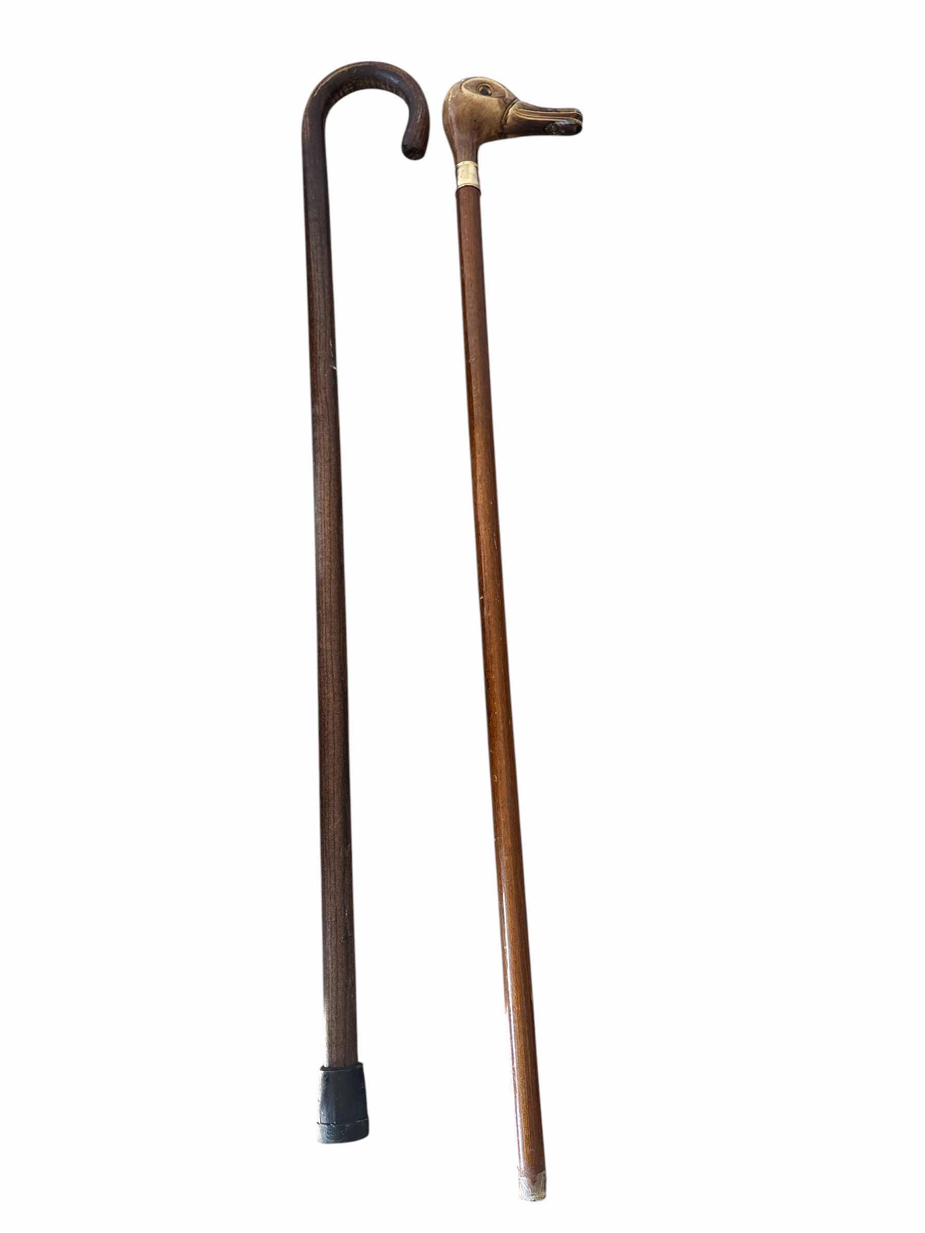 Photo 1 of (4)PCS WOOD WALKING CANES H35”