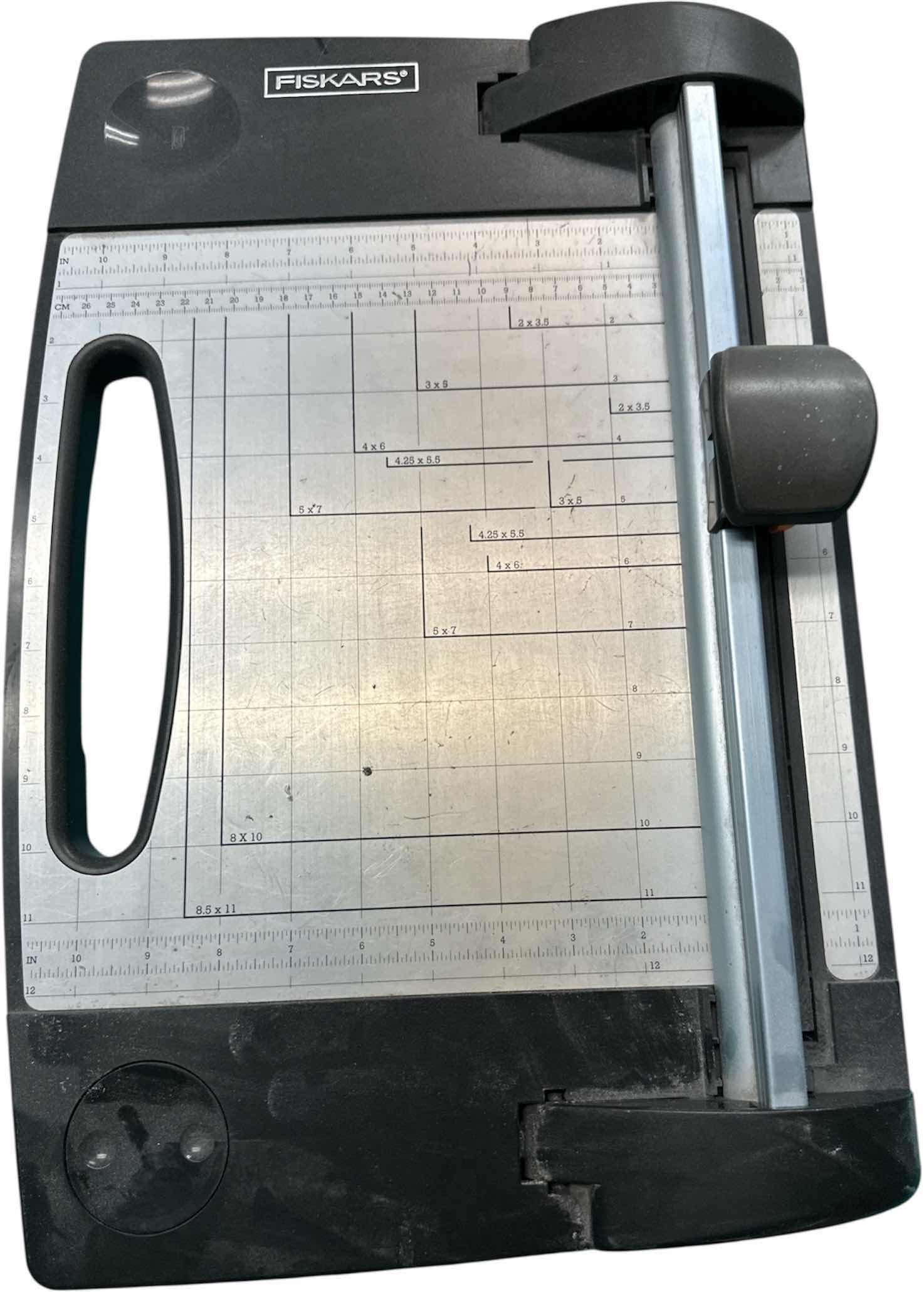 Photo 1 of FISKARS ROTARY PAPER TRIMMER
19.5” X 13” X 3.75”H