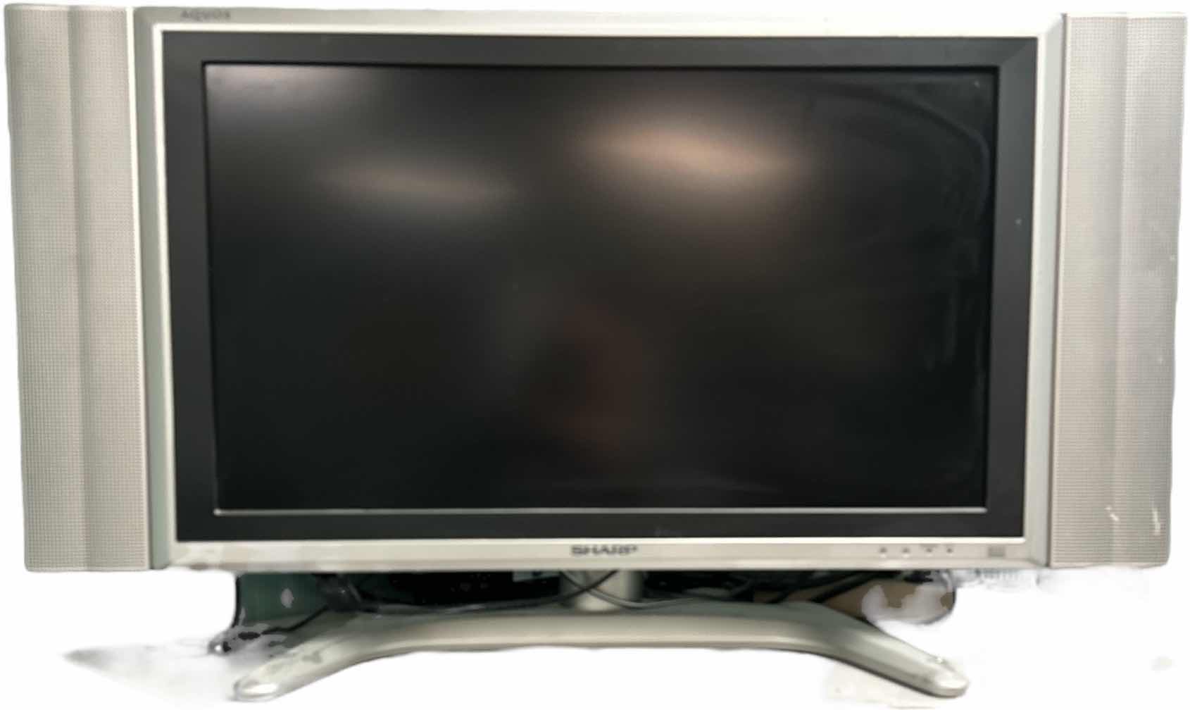 Photo 1 of 25” SHARP AQUOS TV WITH ATTACHED SIDE SPEAKERS
33.5” X 11” X 19.25”H