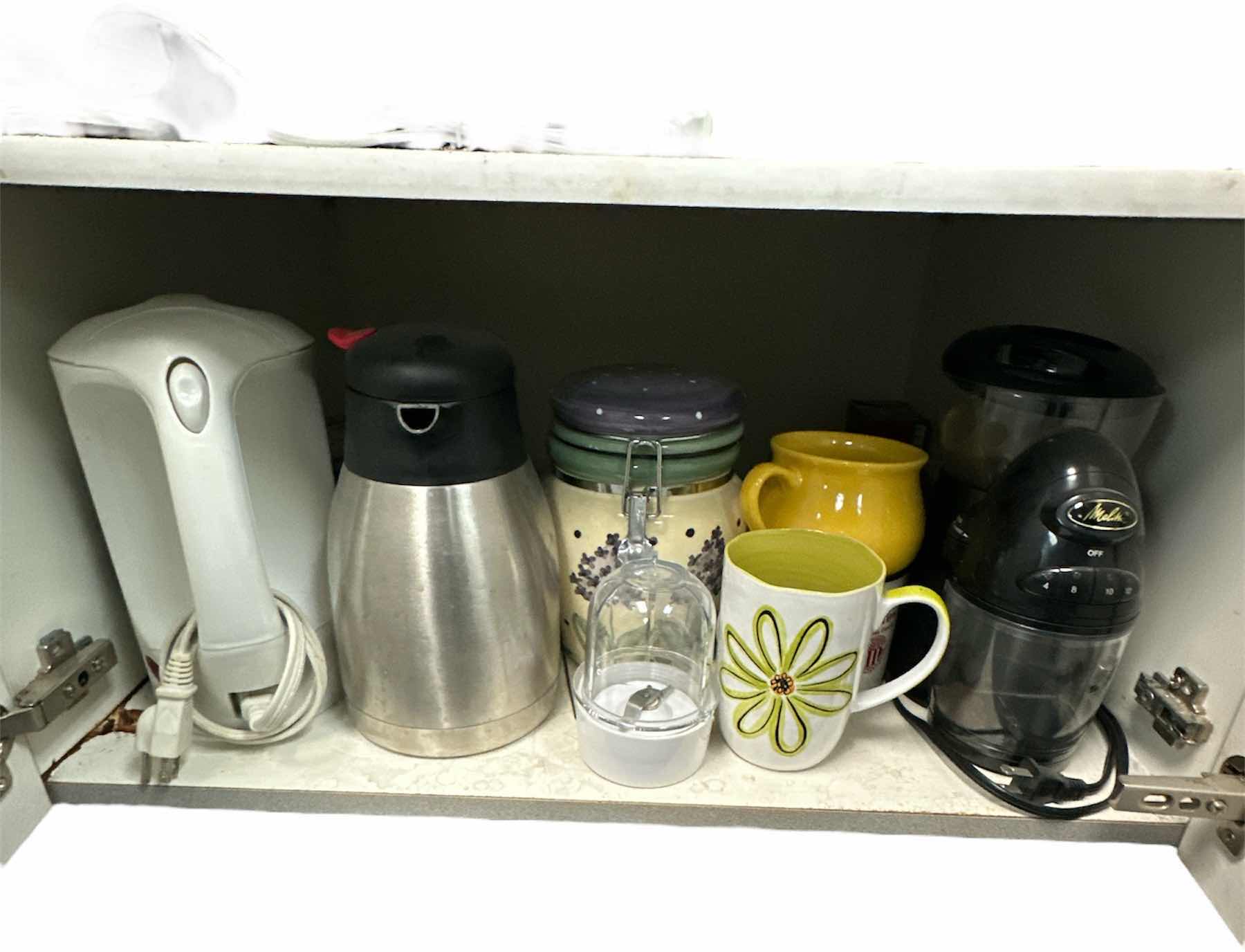 Photo 1 of *hold* CONTENTS OF CABINET