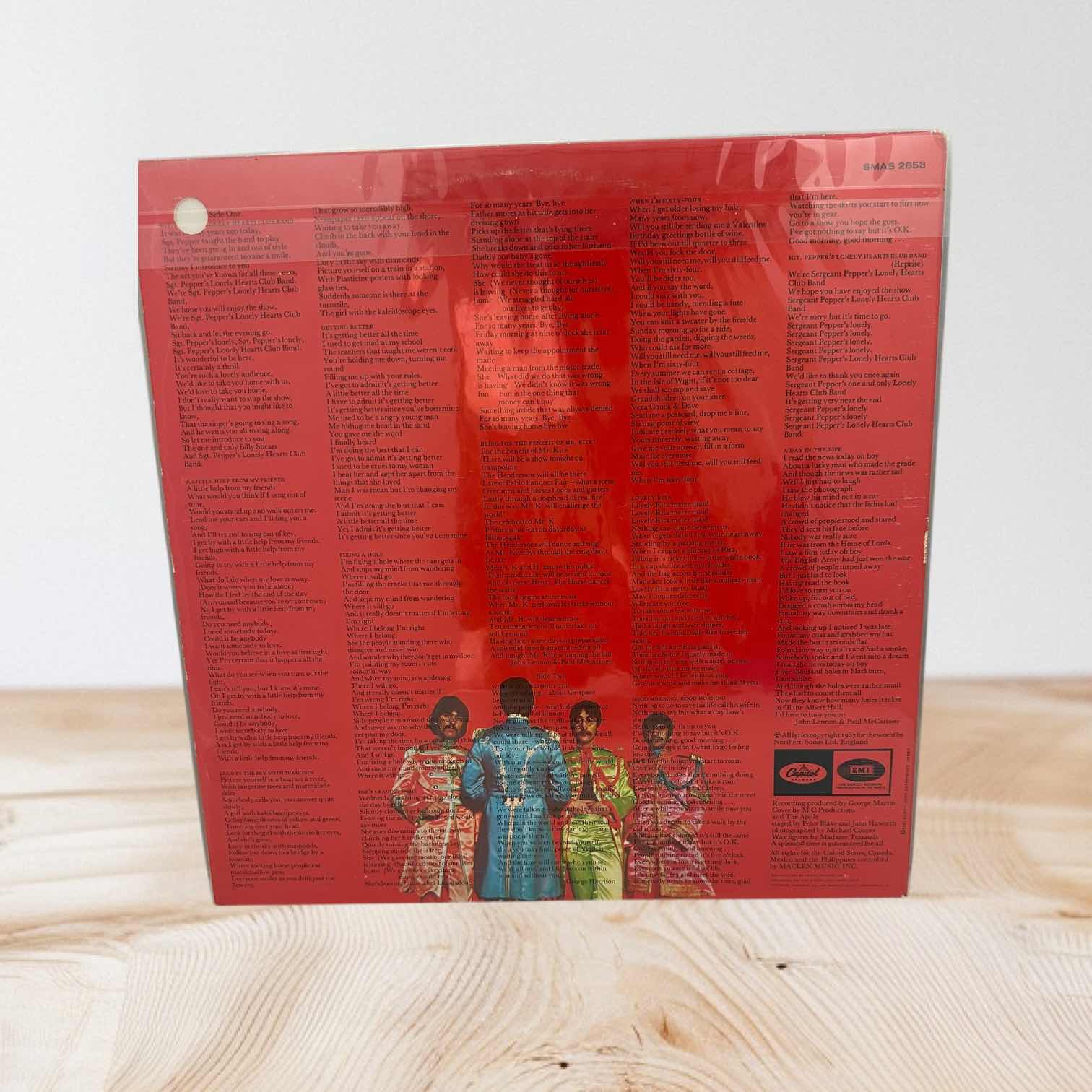 Photo 1 of BEATLES 1967 SGT. PEPPERS VINYL ALBUM IN SEALED WRAPPING