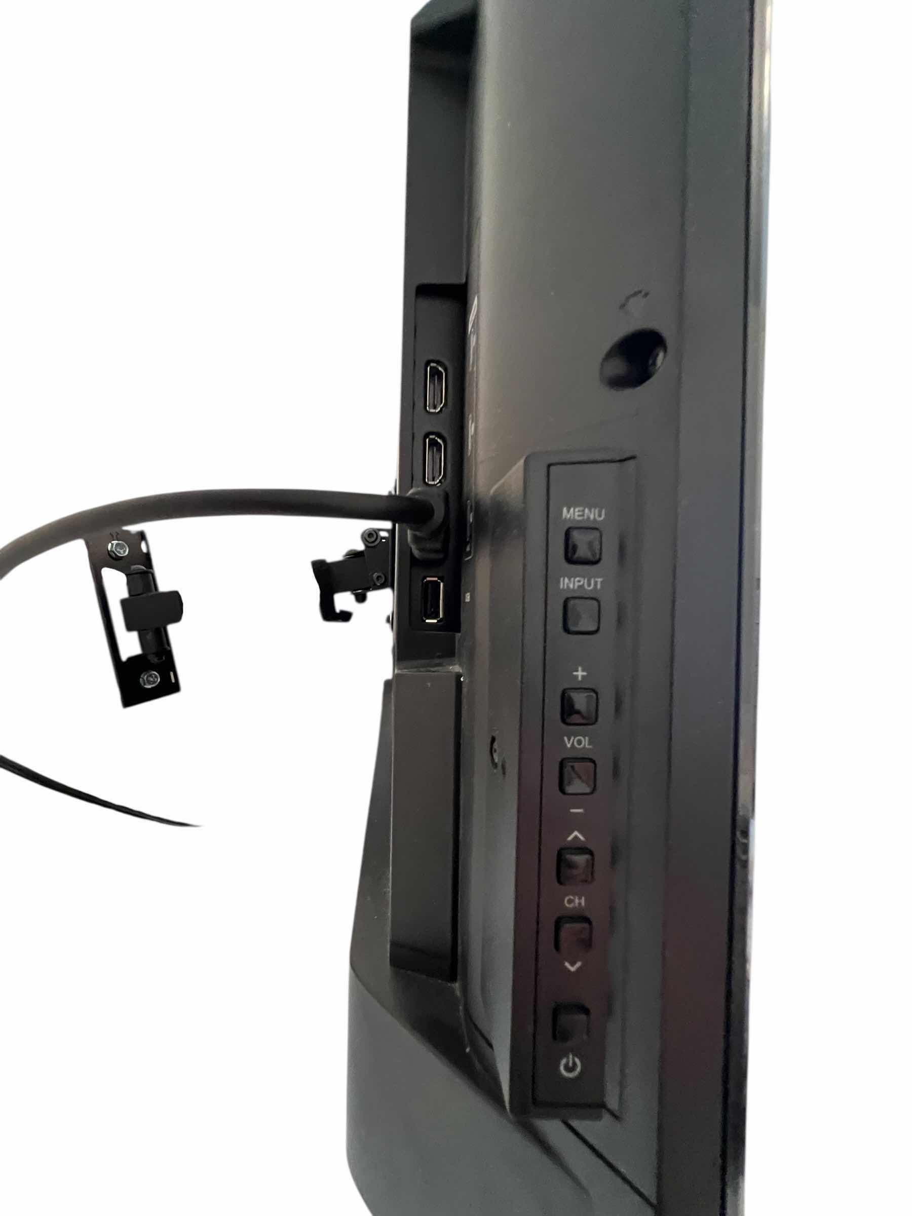 Photo 1 of SHARP 32” FLAT SCREEN TV WITH REMOTE IN WORKING CONDITION