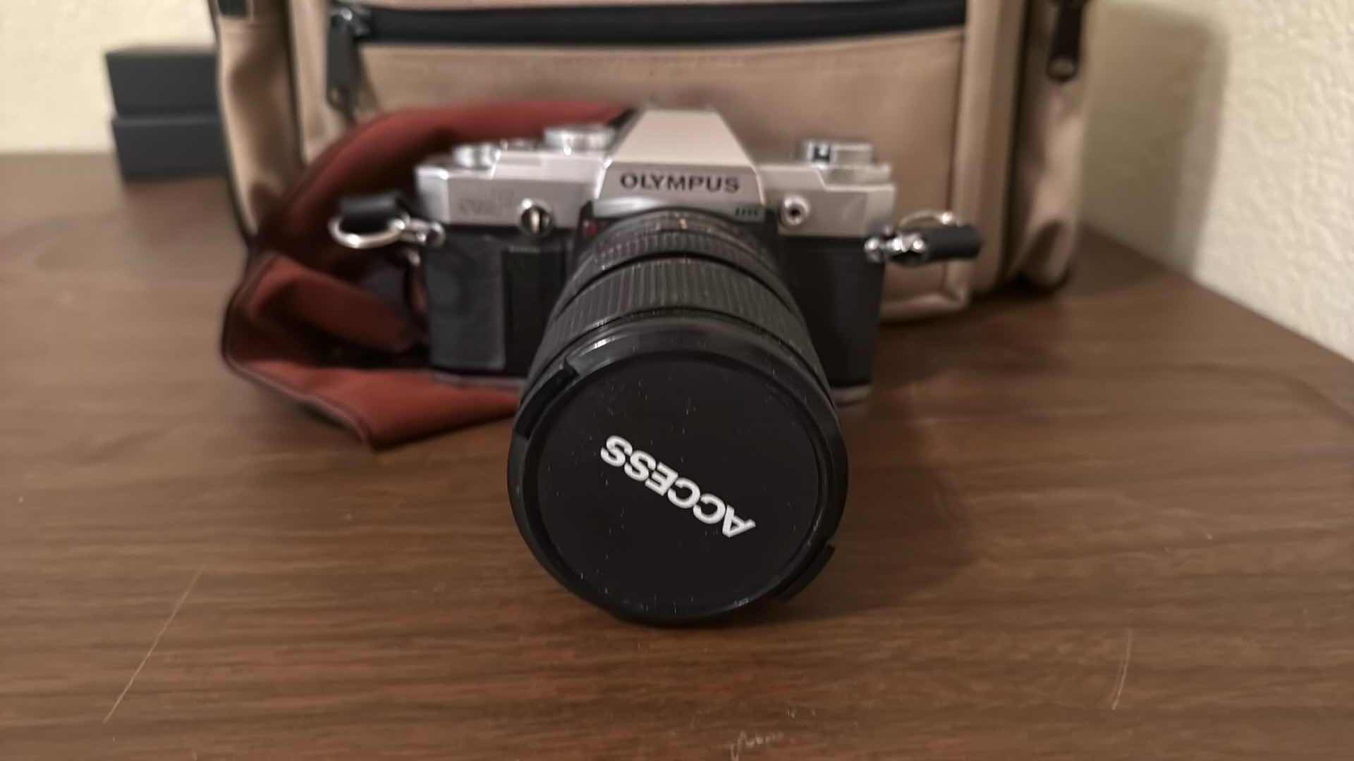 Photo 1 of OLYMPUS CAMERA W CARRYING CASE