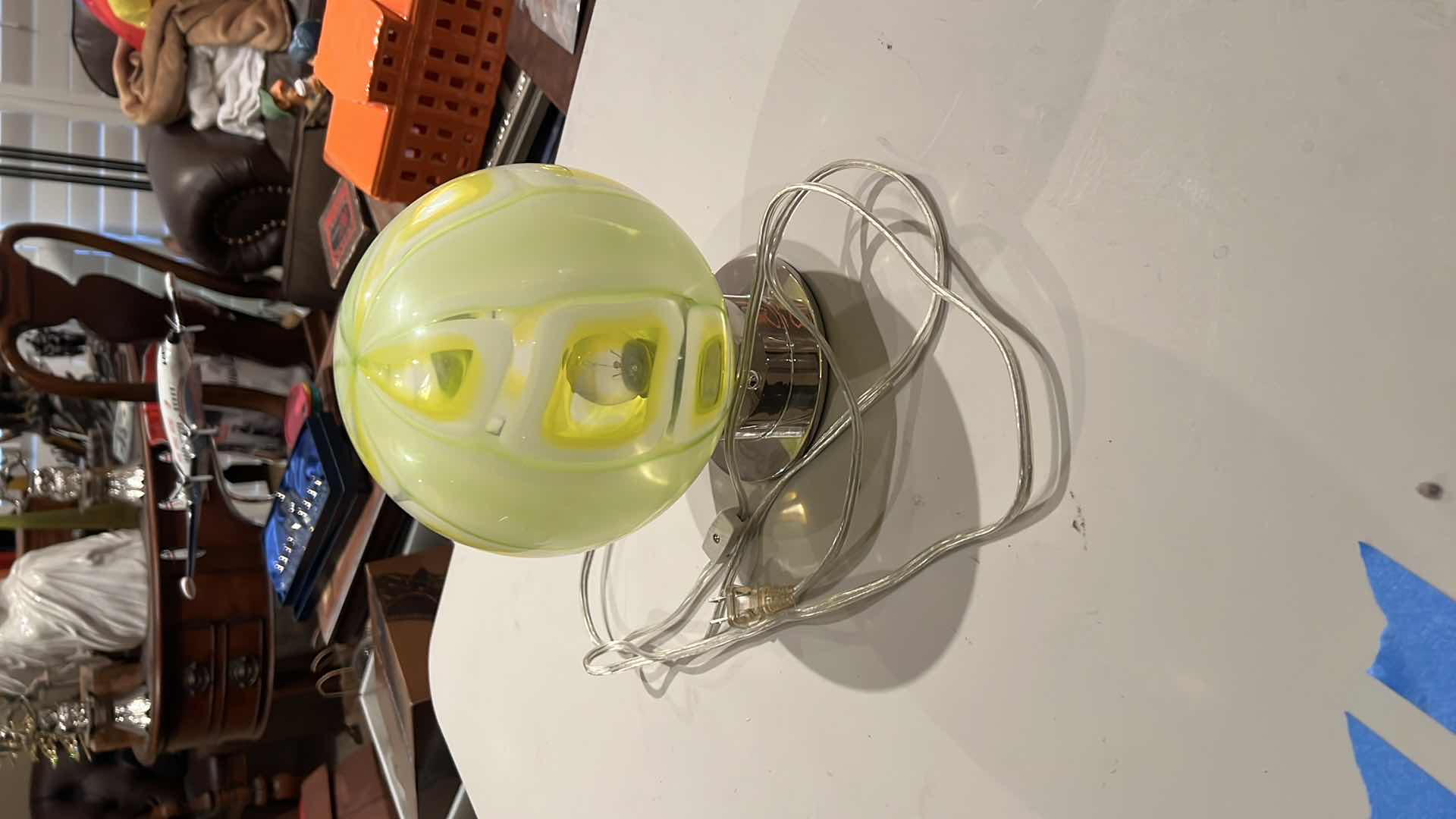 Photo 1 of ART GLASS GLOBE LAMP ON SILVER METAL BASE