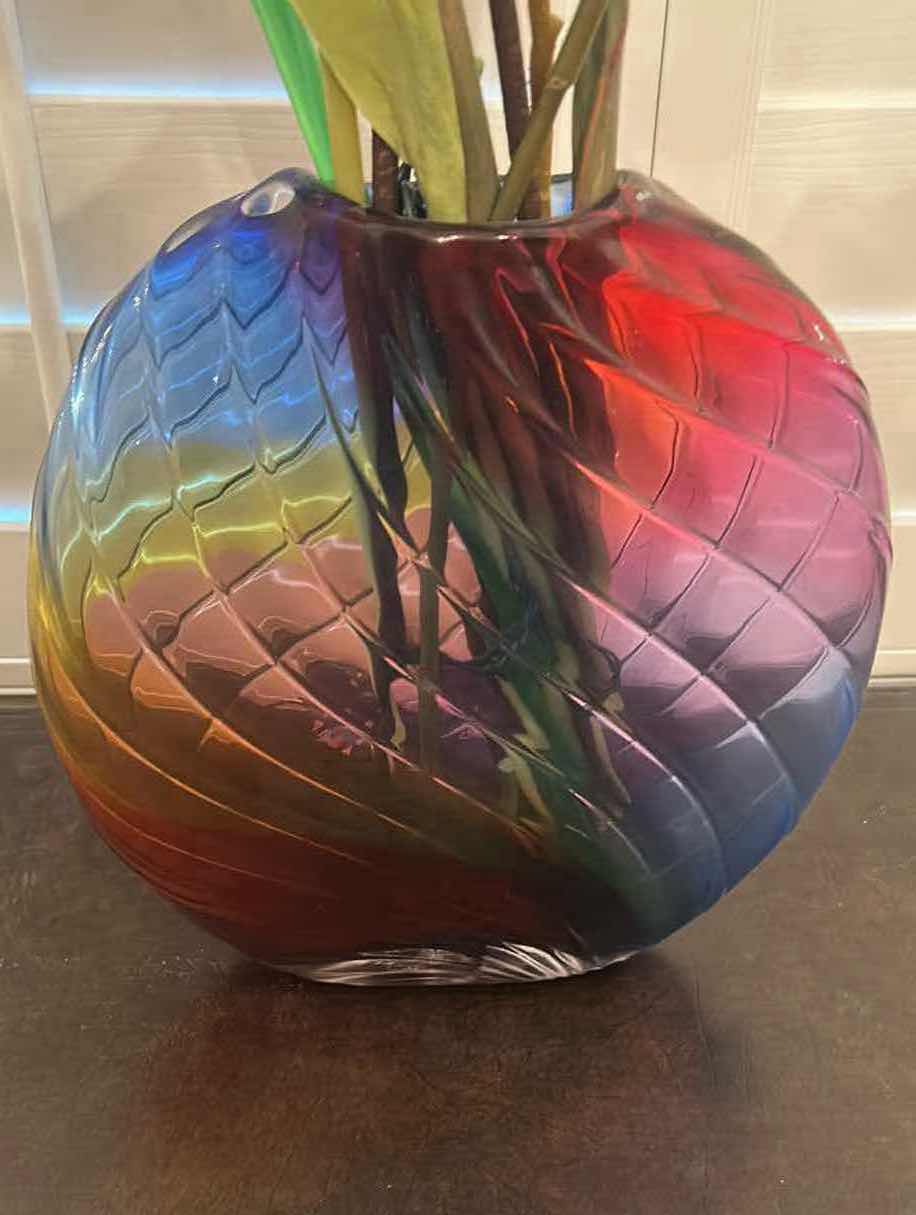 Photo 1 of DECORATIVE FLORAL ARRANGEMENT IN A MULTI COLORED GLASS VASE H 36"