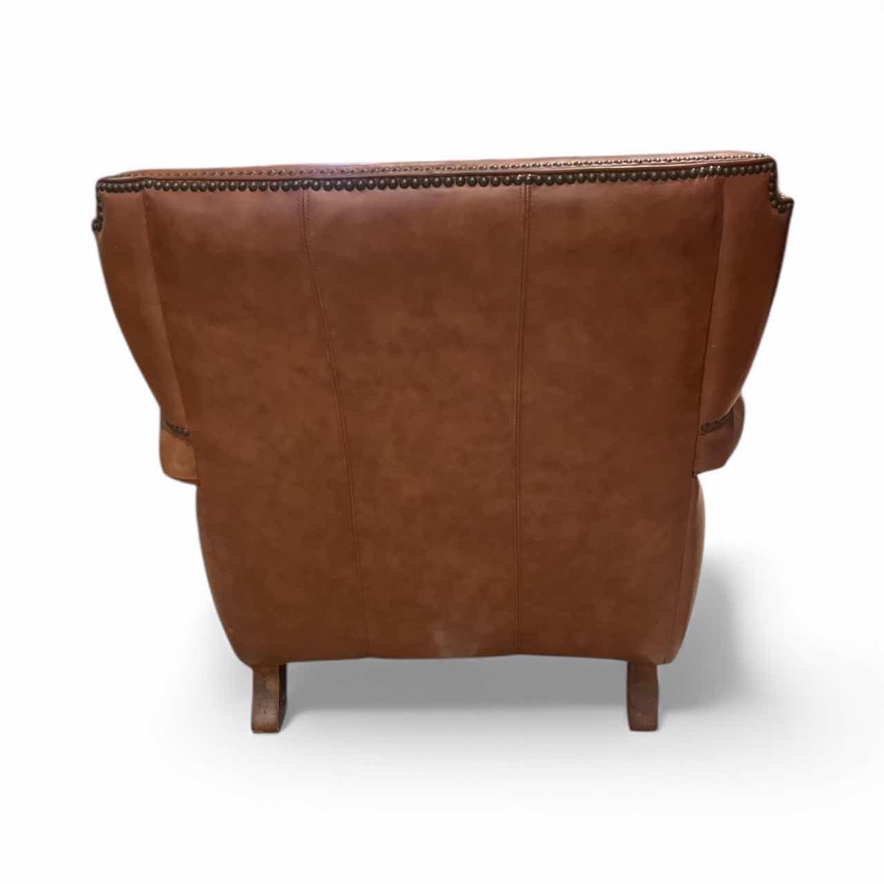 Photo 1 of BROWN LEATHER WINGBACK ACCENT CHAIR WITH NAILHEAD TRIM 33.5”H OF CHAIR BACK AND 34”W