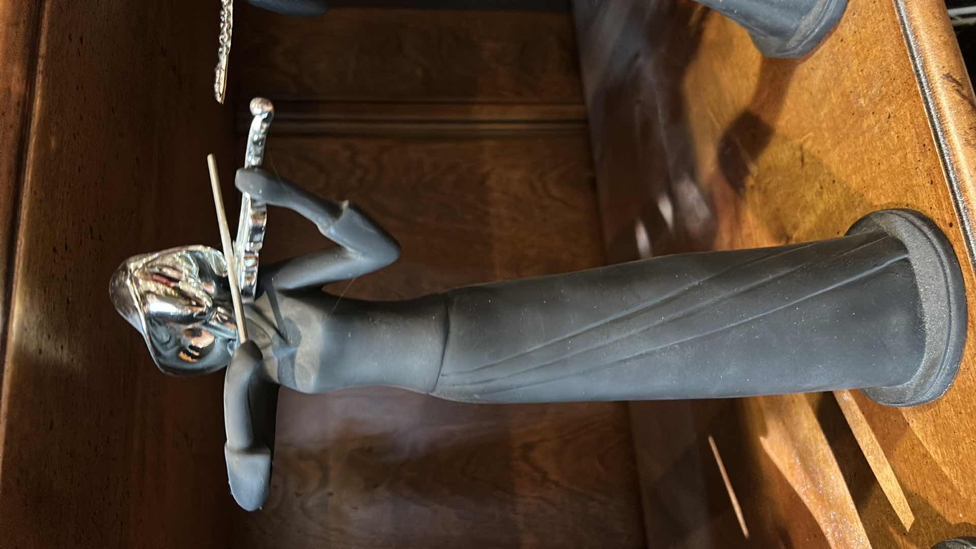 Photo 1 of 6 BLACK AND SILVER MUSICAL INSTRUMENT-PLAYING FIGURINES H 12”.