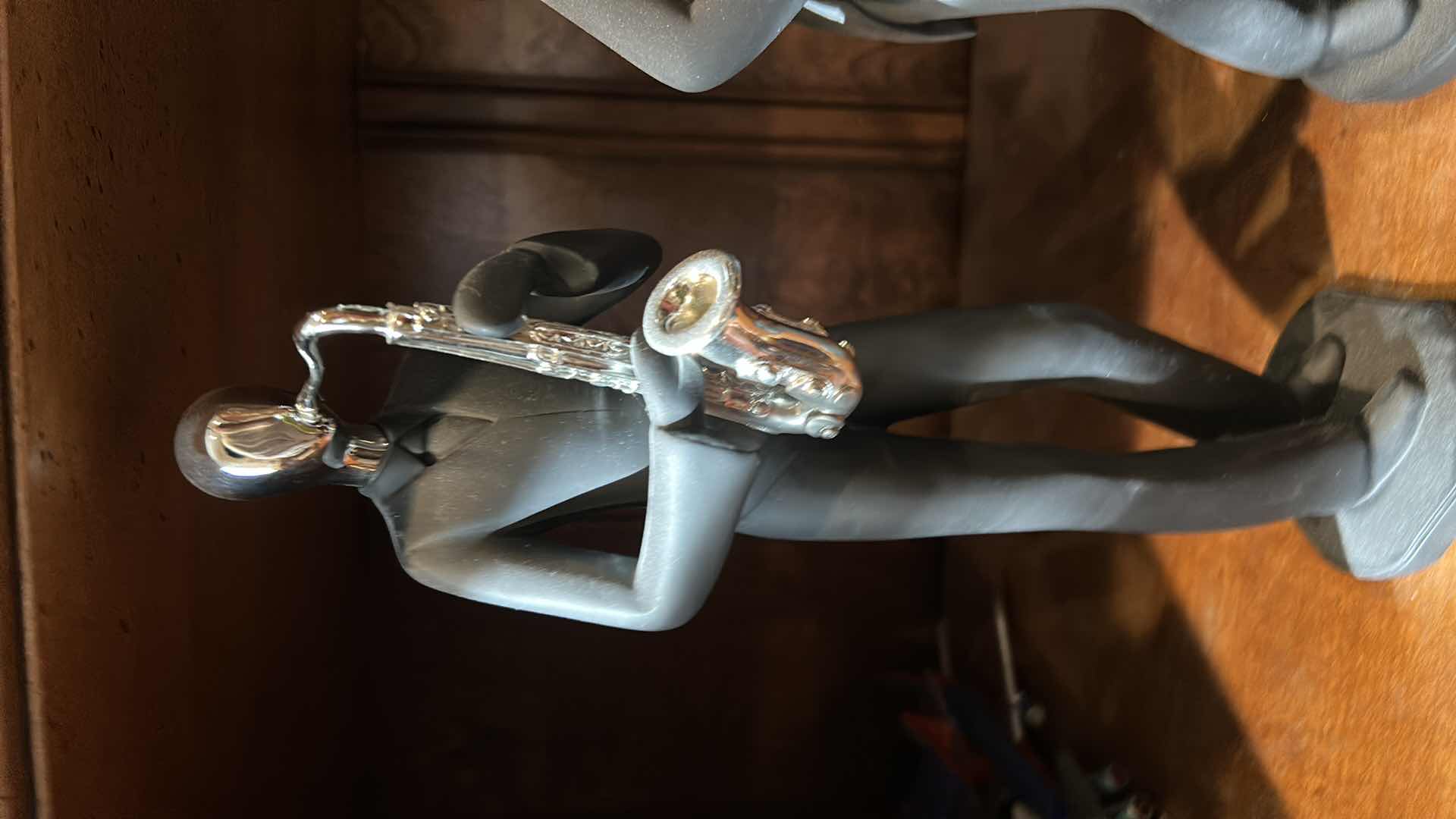 Photo 1 of 6 BLACK AND SILVER MUSICAL INSTRUMENT-PLAYING FIGURINES H 12”.