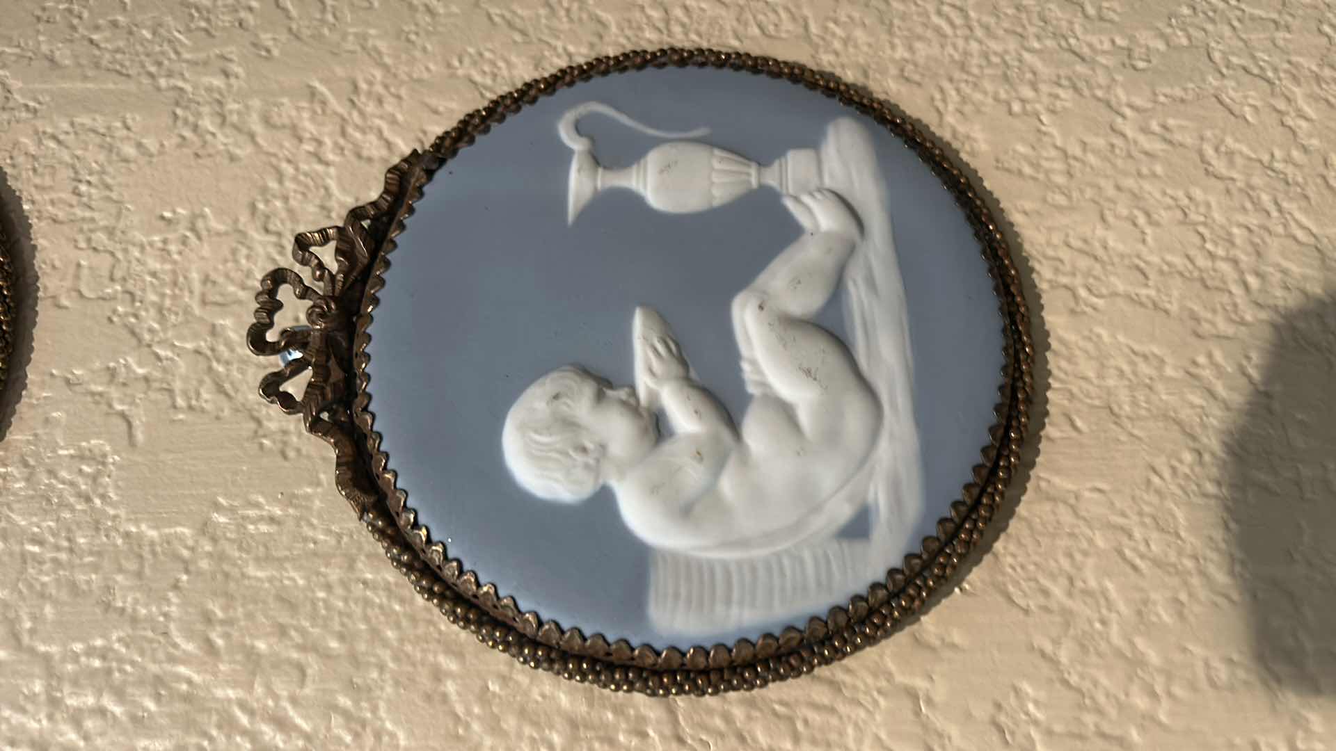 Photo 1 of 2- WEDGWOOD-STYLE JASPERWARE PLAQUES, LIKELY DEPICTING CHERUBS OR FIGURES FROM CLASSICAL MYTHOLOGY. H6”