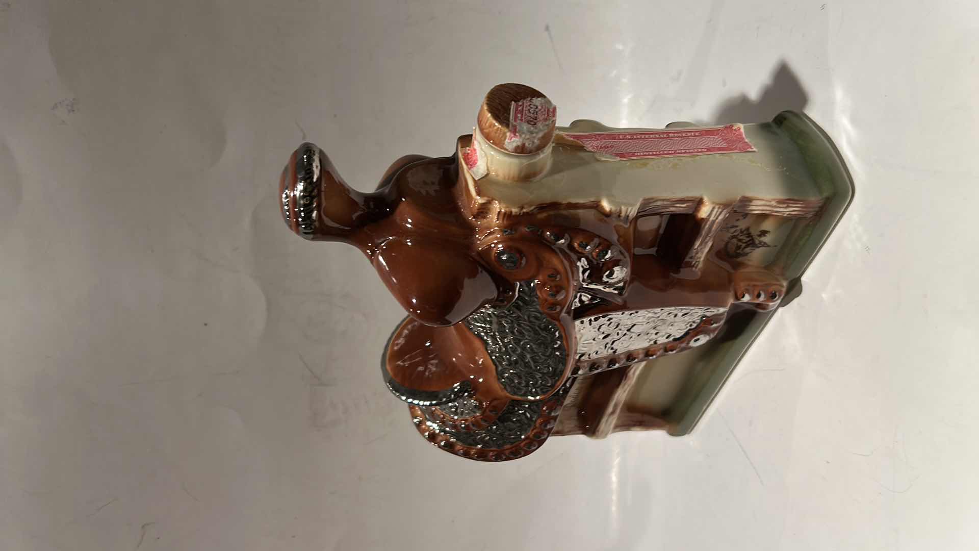 Photo 1 of VINTAGE 1972 EZRA BROOKS SADDLE DECANTER.