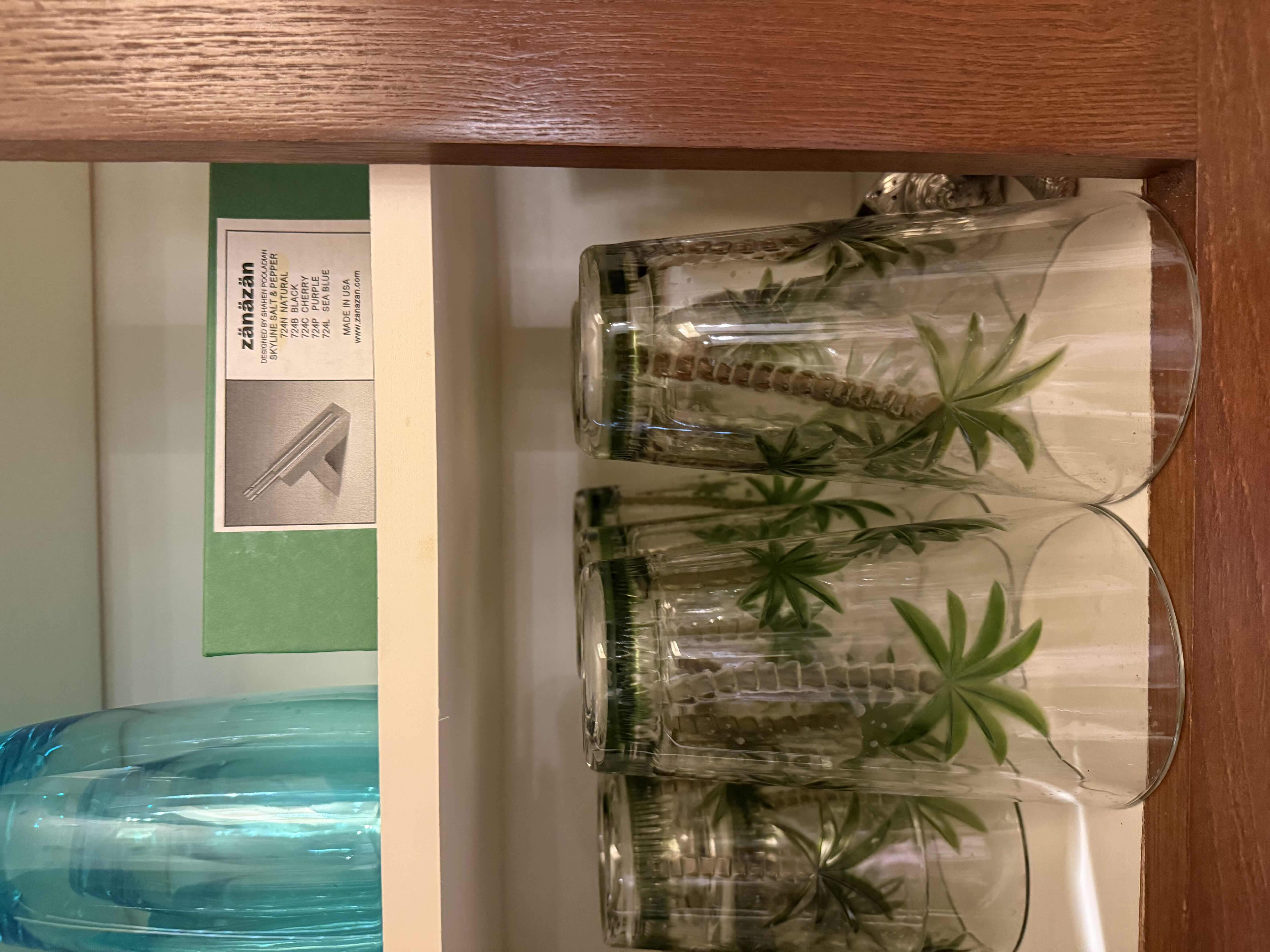 Photo 1 of CONTENTS OF KITCHEN CABINET-DRINKING GLASSES & SALT & PEPPER SHAKERS