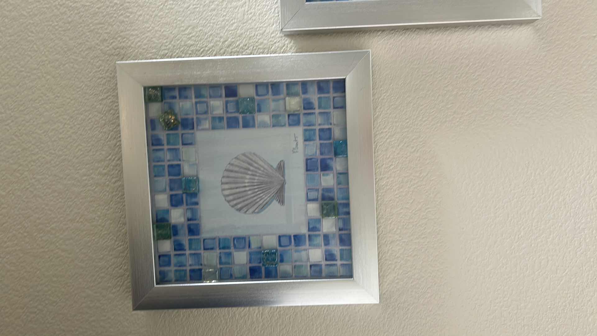 Photo 1 of 2 SILVER FRAMED ART SEASHELLS 12” X 12”